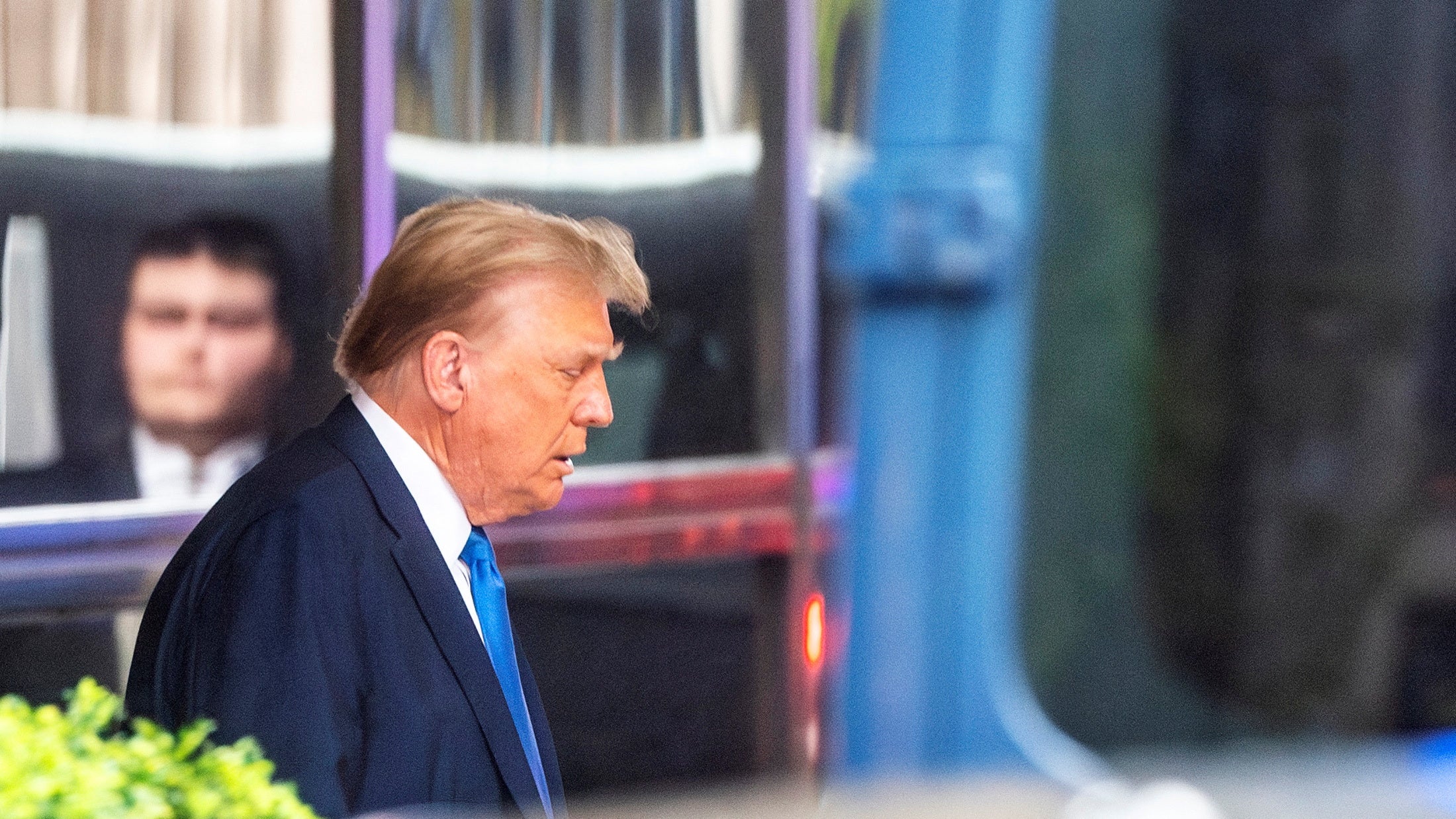 The former president leaving Trump Tower on his way to the courtroom on the third day of the trial