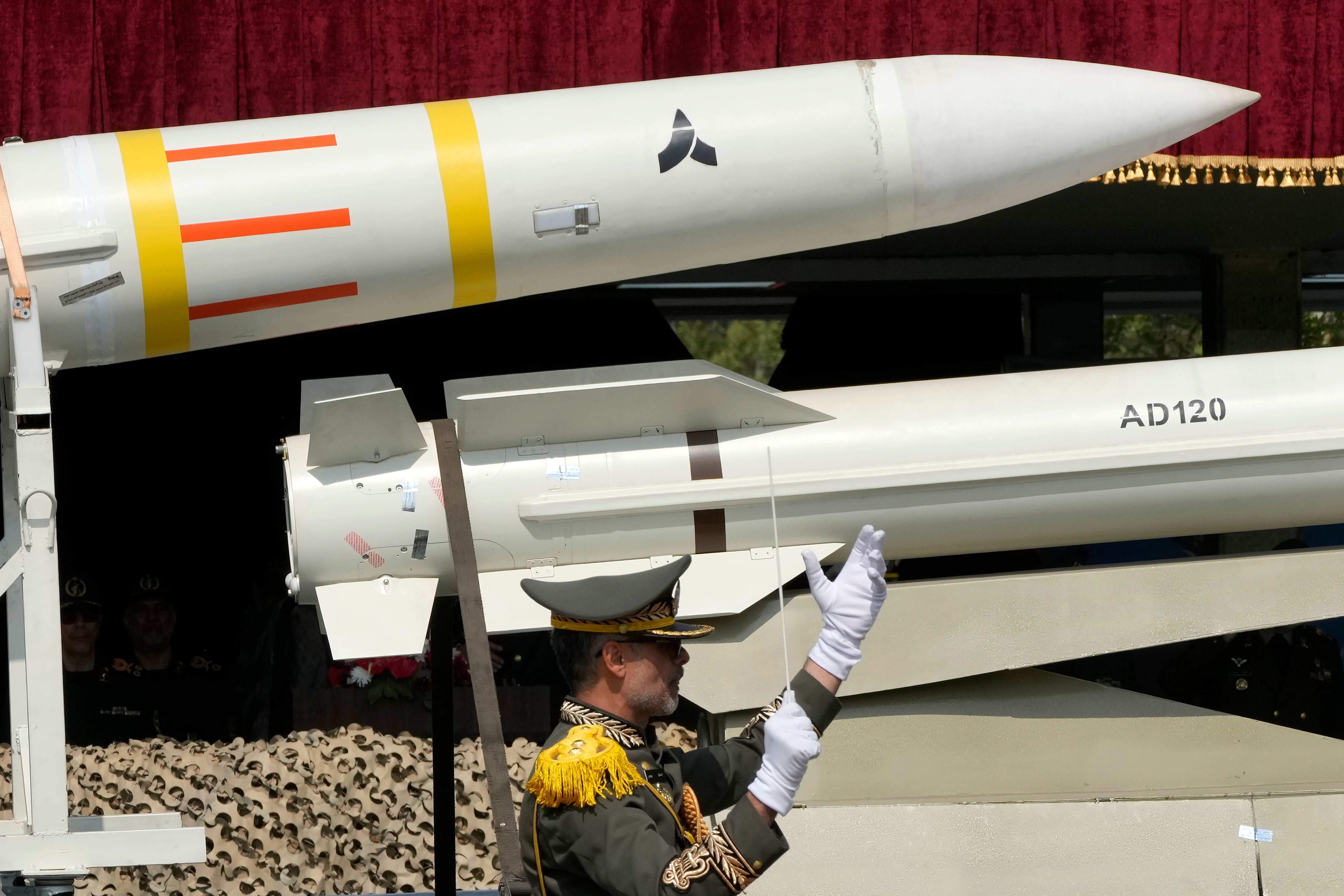 Missiles are carried on a truck during an Army Day parade at a military base in northern Tehran