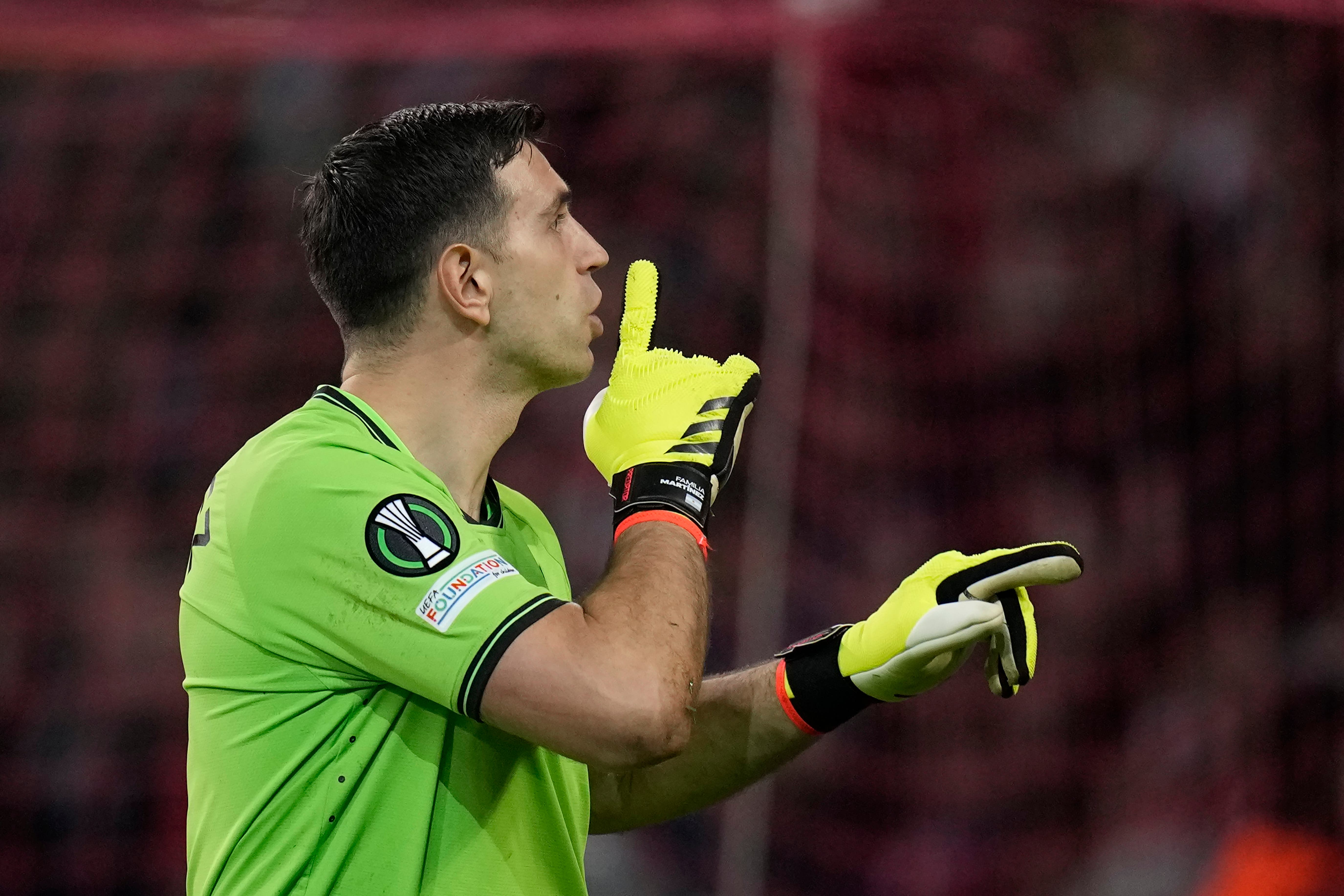 Emiliano Martinez was the hero as Aston Villa advanced to the semi-finals of the Europa Conference League (Christophe Ena/AP)