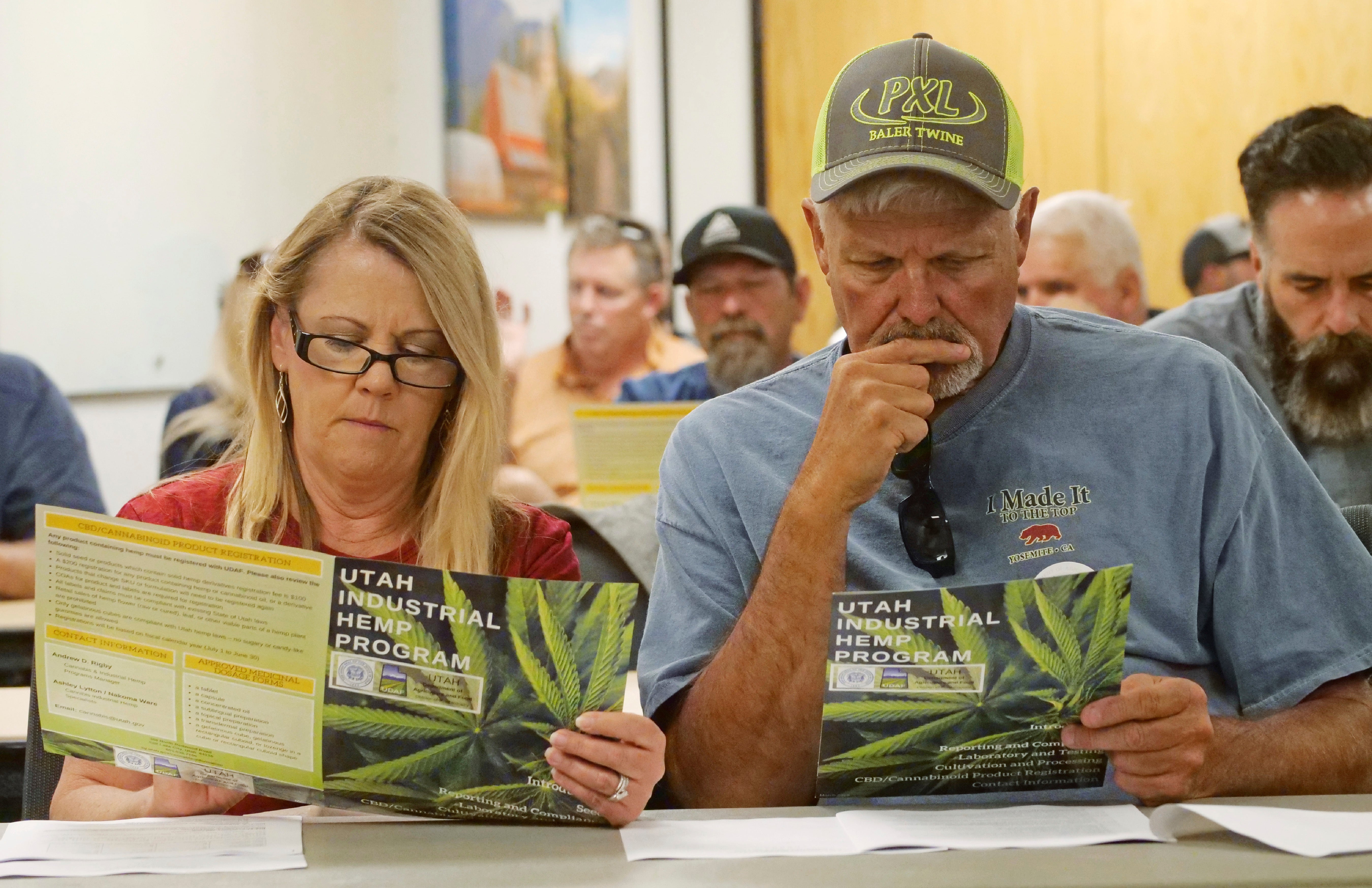 Alfalfa farmers Diane and Russ Jones look on during a public hearing on medical cannabis