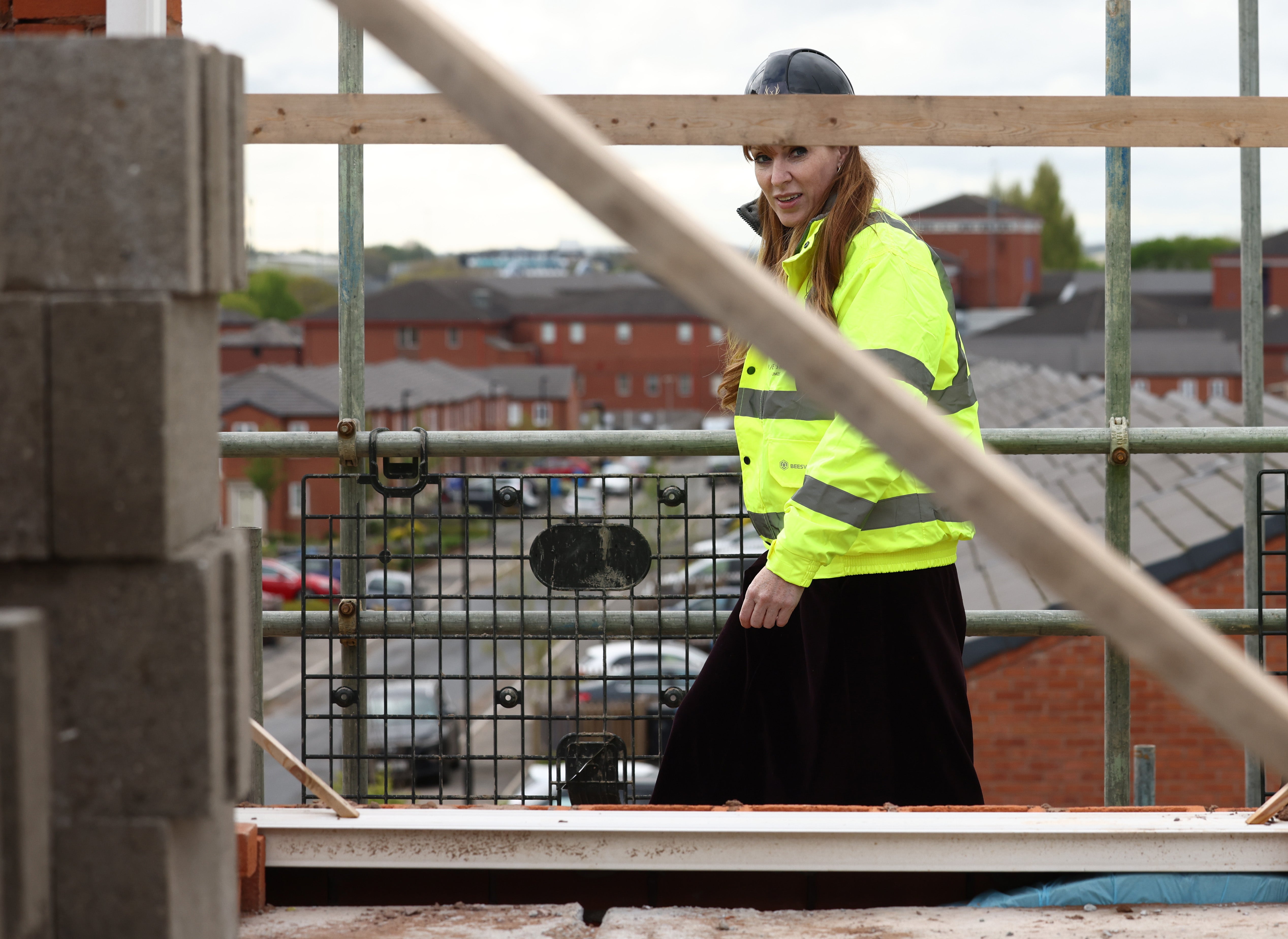 Labour Deputy Leader Angela Rayner looks at a home under construction during a visit to the Nightingale Quarter on April 19, 2024 in Derby