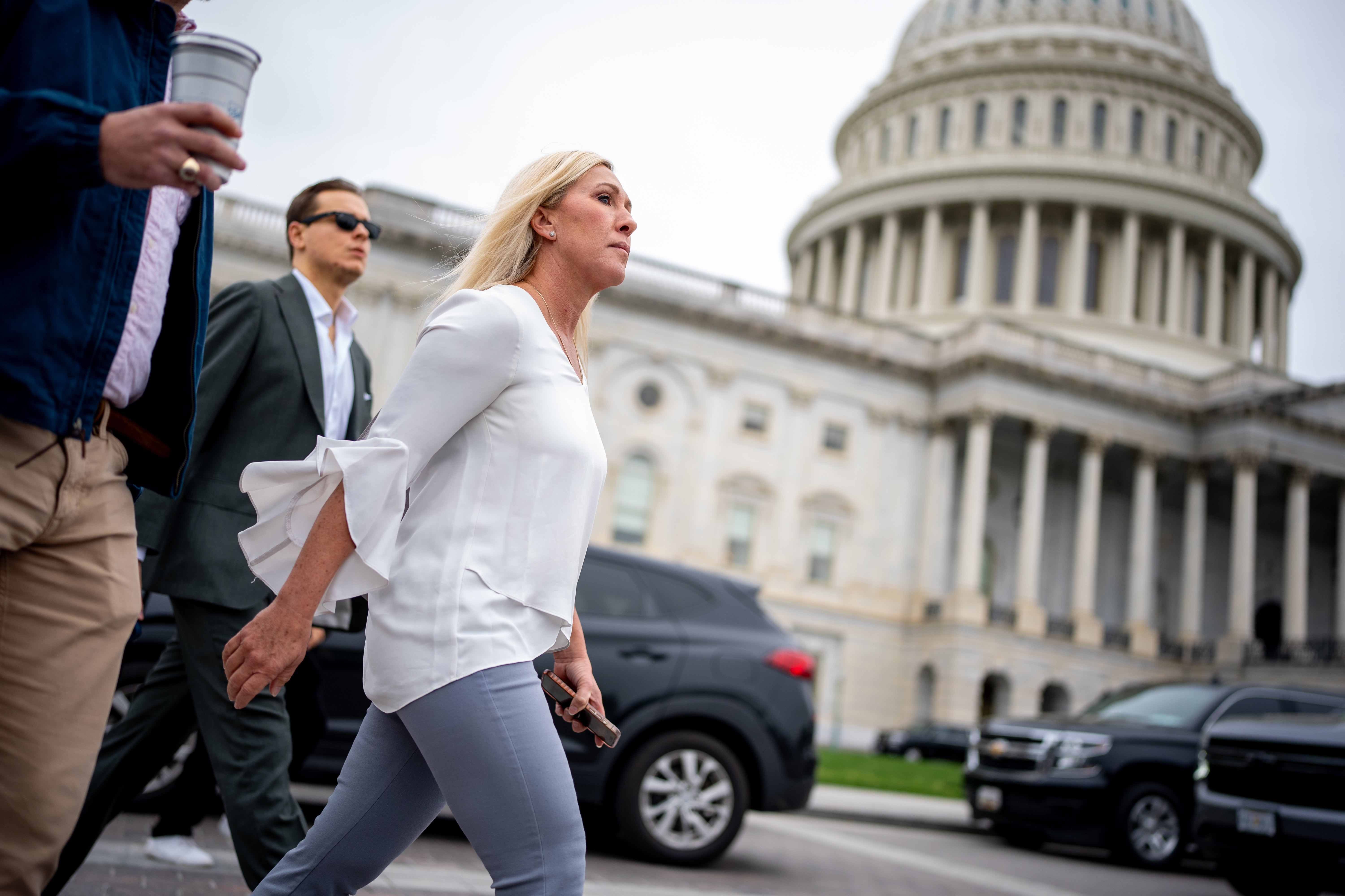 Marjorie Taylor Greene departs Capitol Hill following a vote on Friday