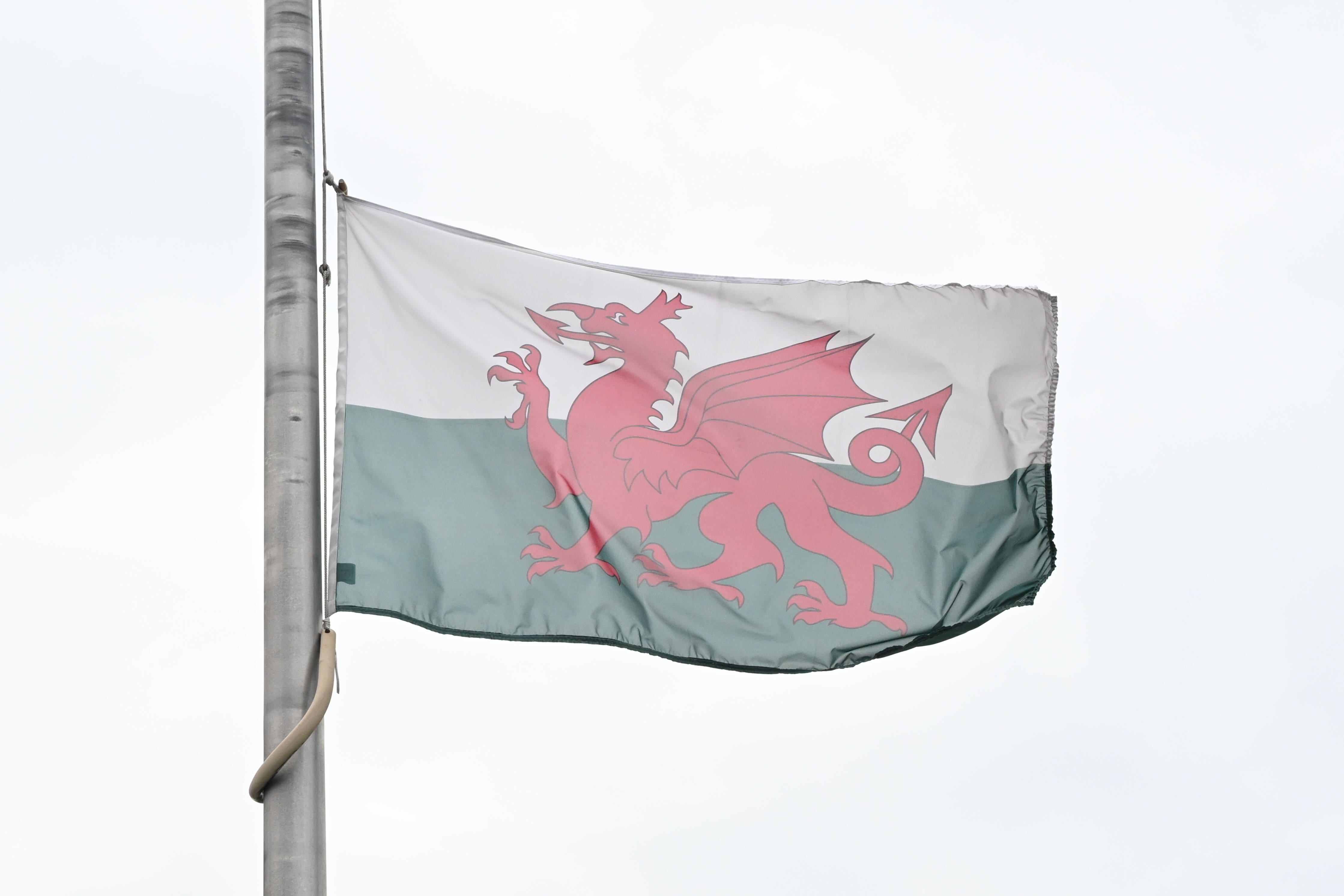 Welsh Parliament handout photo dated 11/09/22 of the Welsh flag is flown at half mast to pay tribute to Her Majesty Queen Elizabeth II at The Senedd in Cardiff, Wales. Picture date: Sunday September 11, 2022.