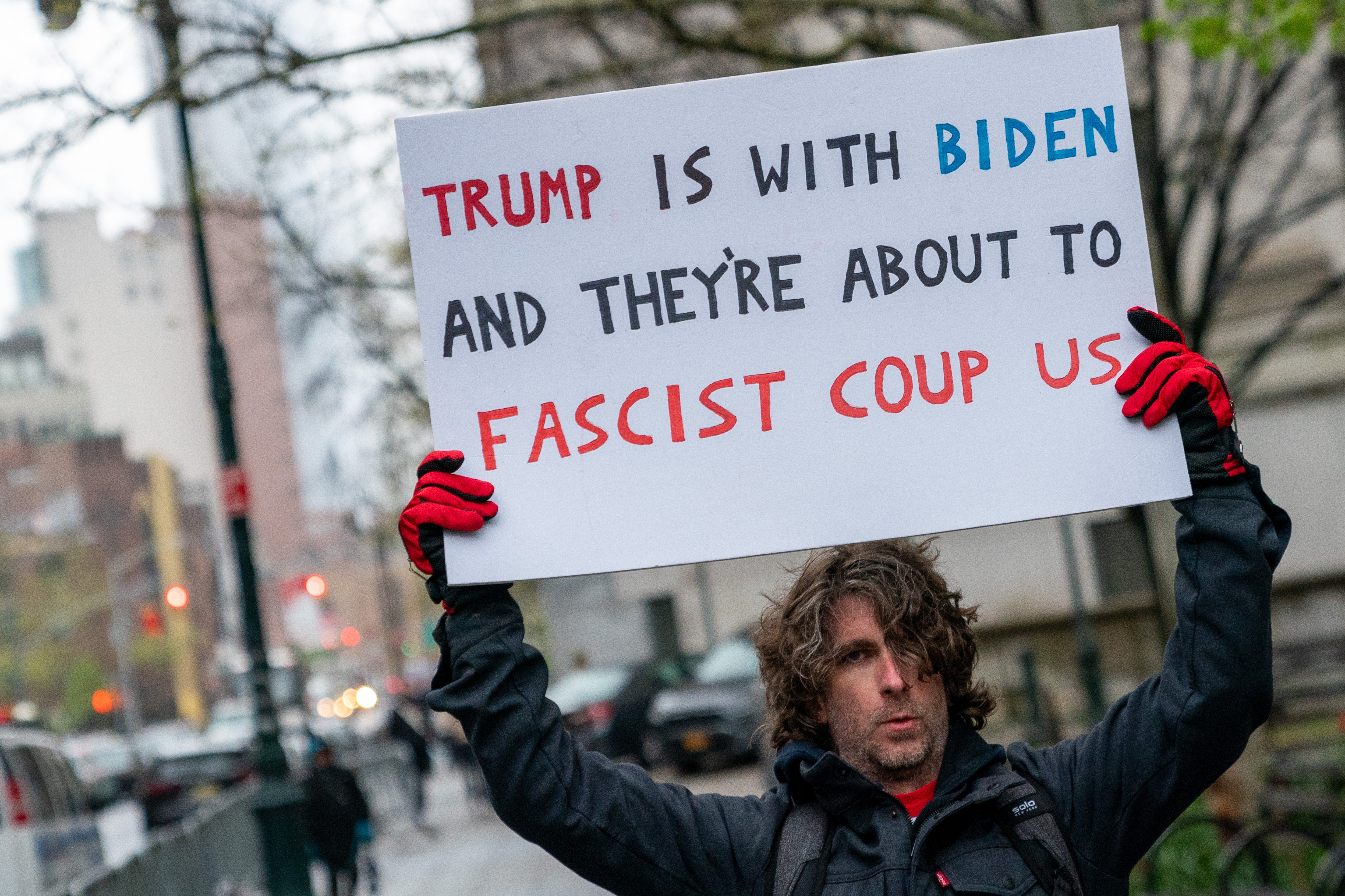 Maxwell Azzarello pictured protesting outside Donald Trump’s trial at Manhattan Criminal Court one day before self-immolating near the same location