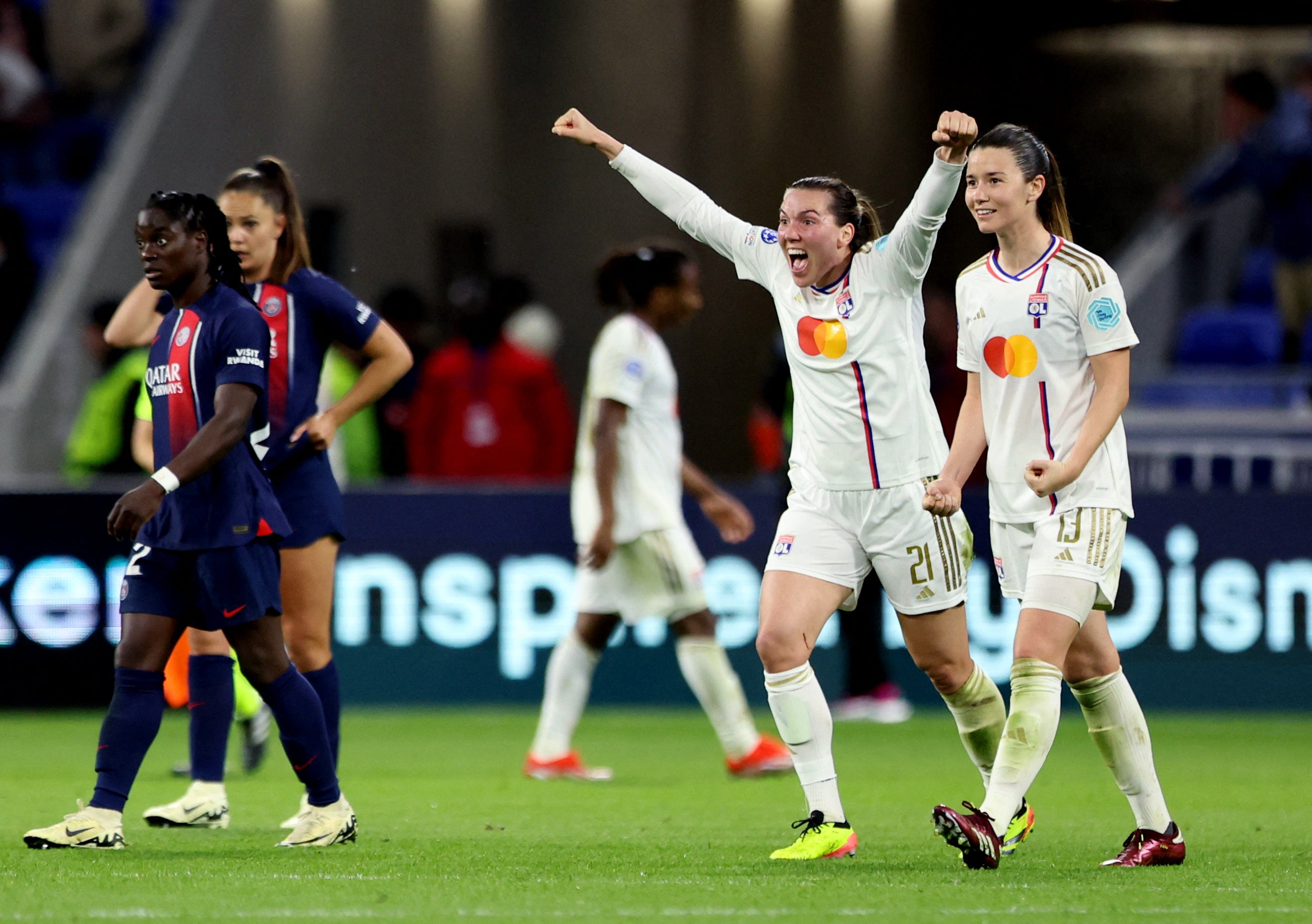 Lyon’s Damaris Egurrola and Vanessa Gilles celebrate the comeback