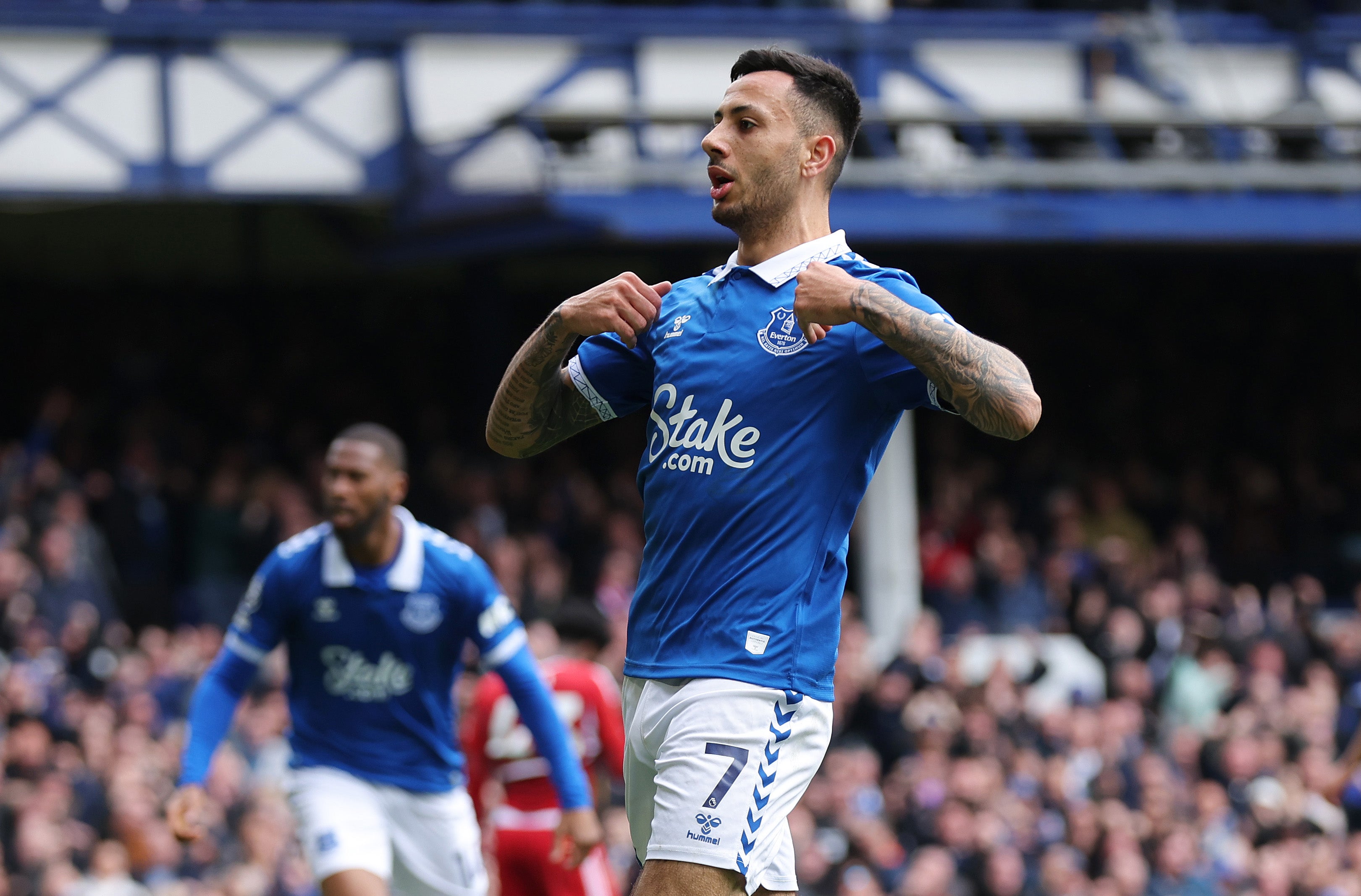 Dwight McNeil celebrates after scoring Everton’s second goal