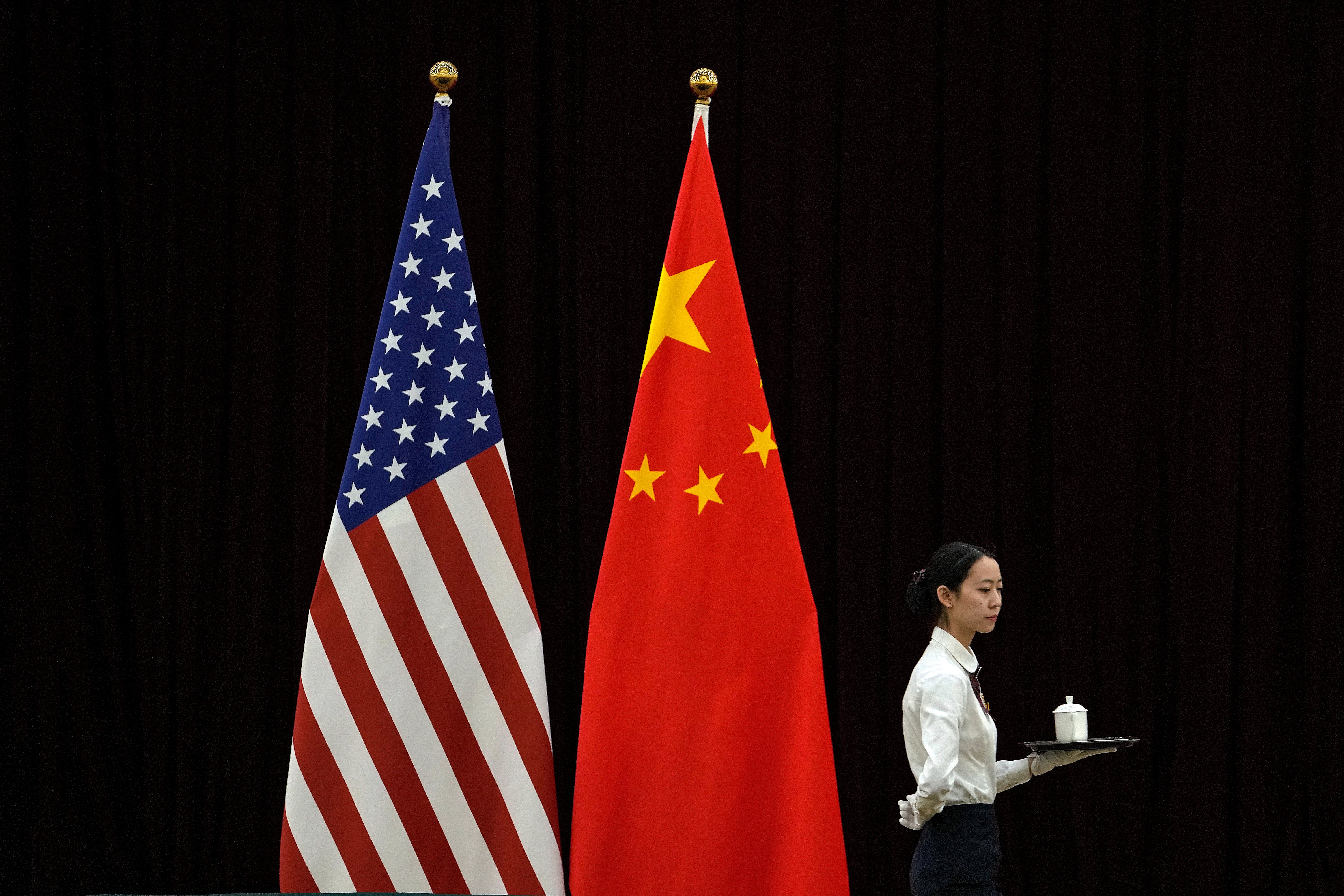 An American and Chinese flag