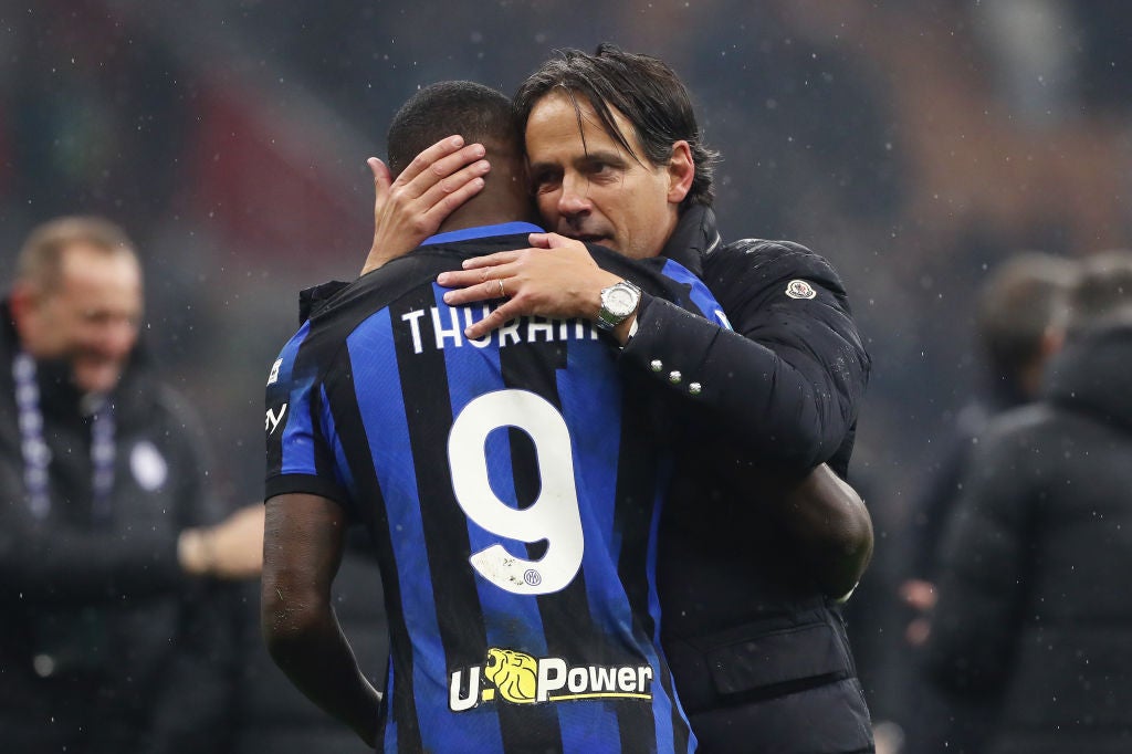 Simone Inzaghi celebrates with Marcus Thuram