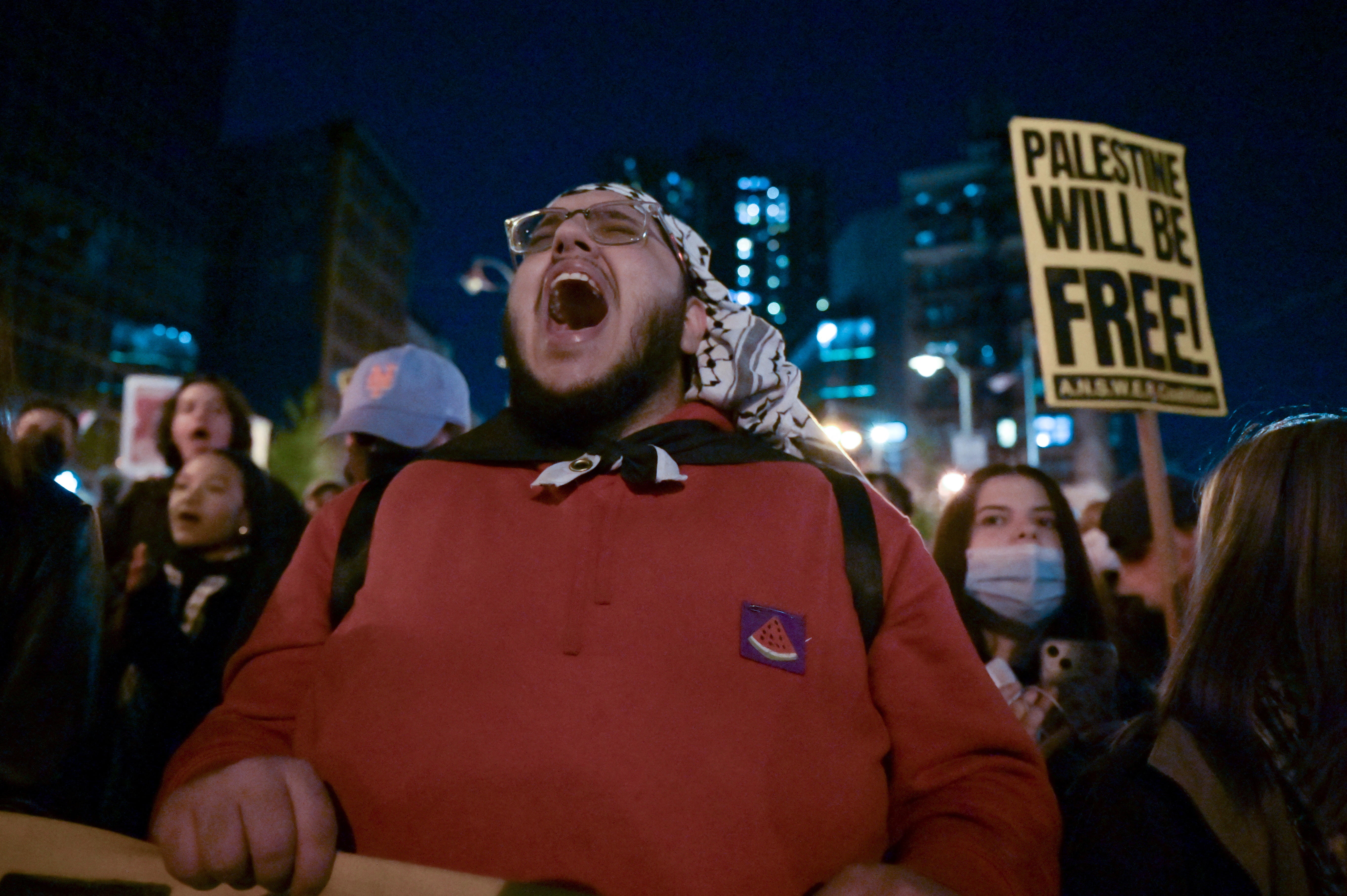 Protesters chant near city hall in lower Manhattan after attending an occupation at New York University