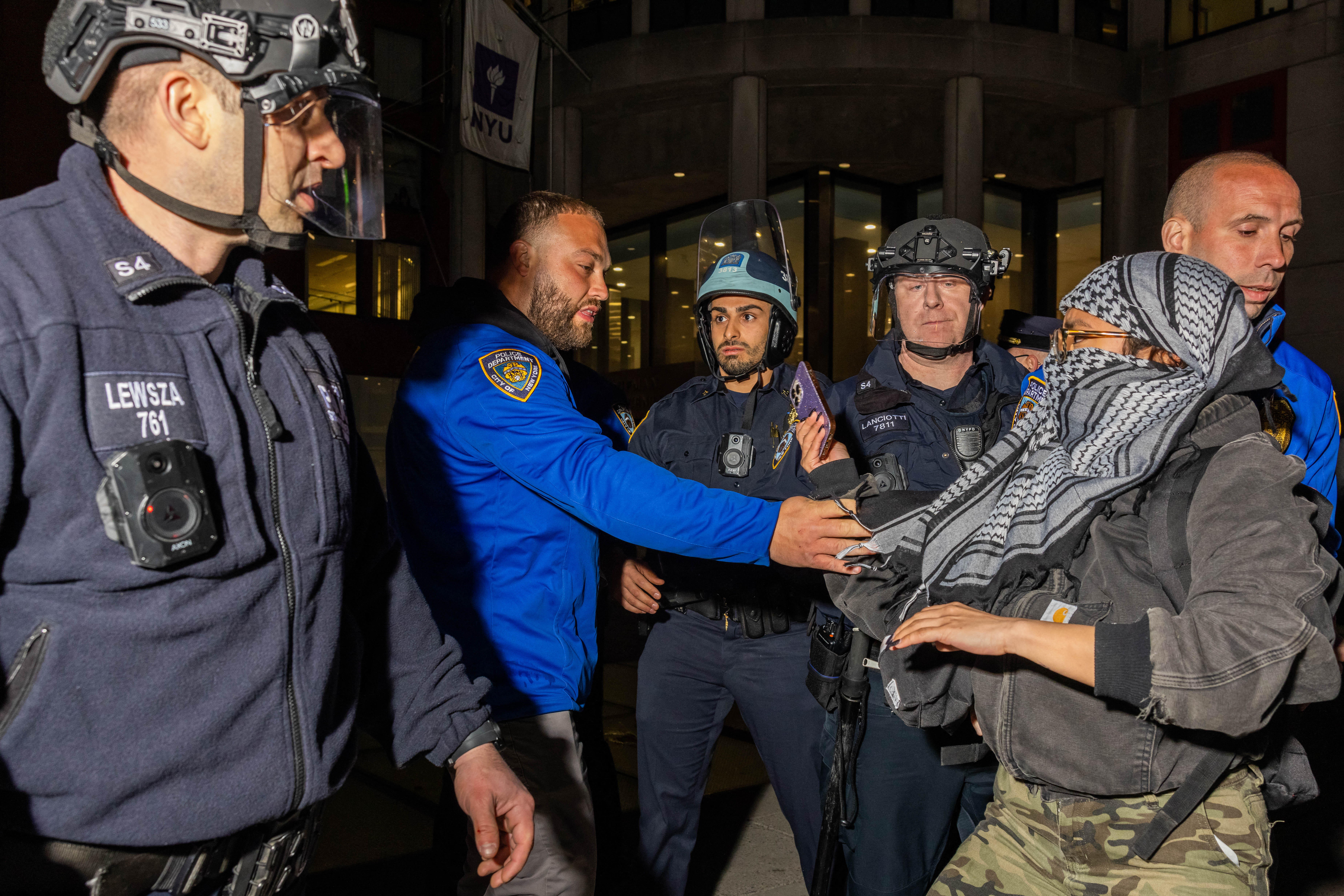 NYPD officers detain pro-Palestinian students and protesters at New York University