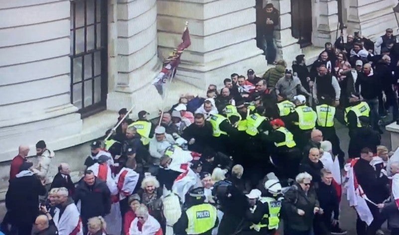 Activists storm past to get out of agreed parade area