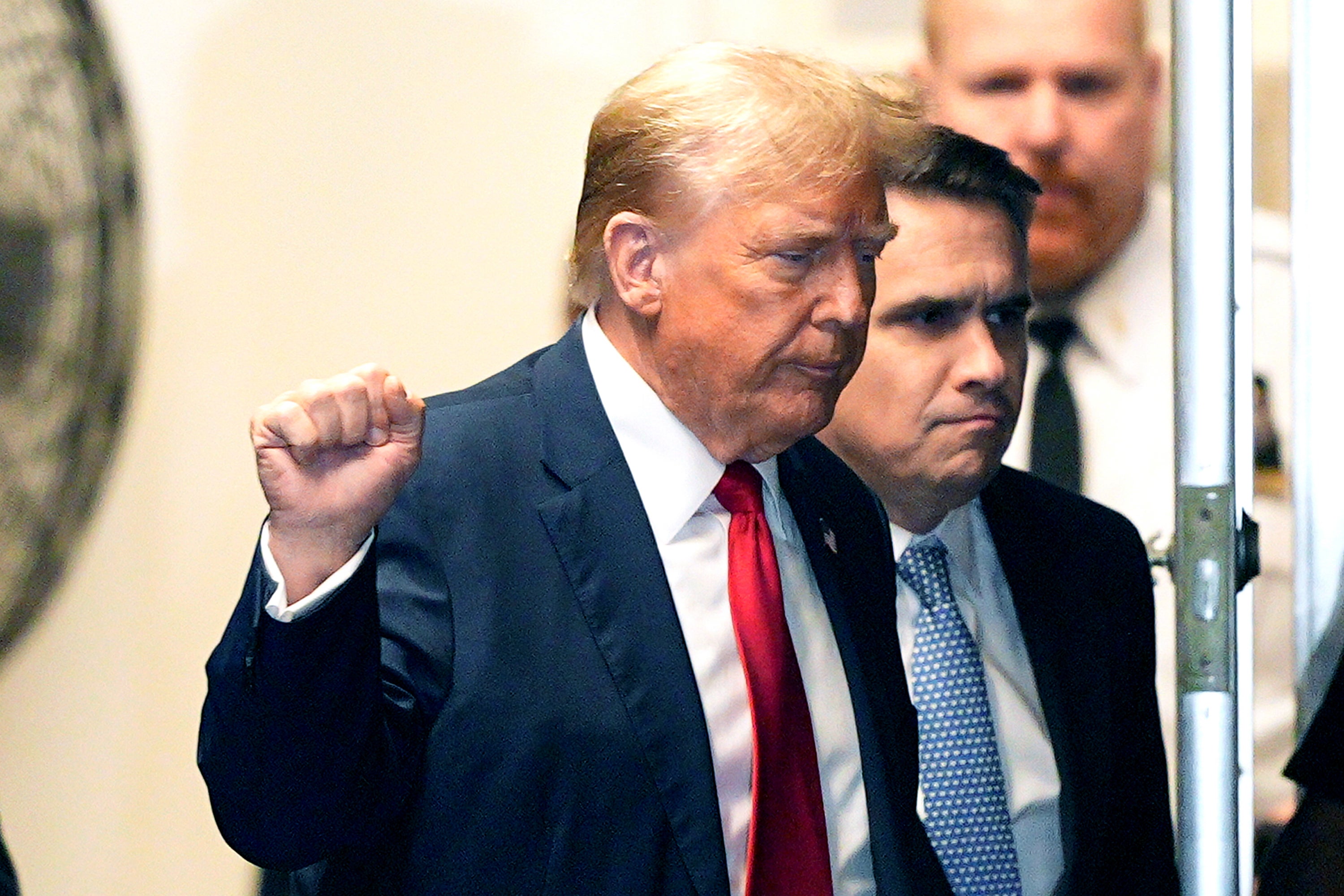 Former President Donald Trump appears outside the courtroom during his trial for allegedly covering up hush money payments at Manhattan Criminal Court on 23 April 2024