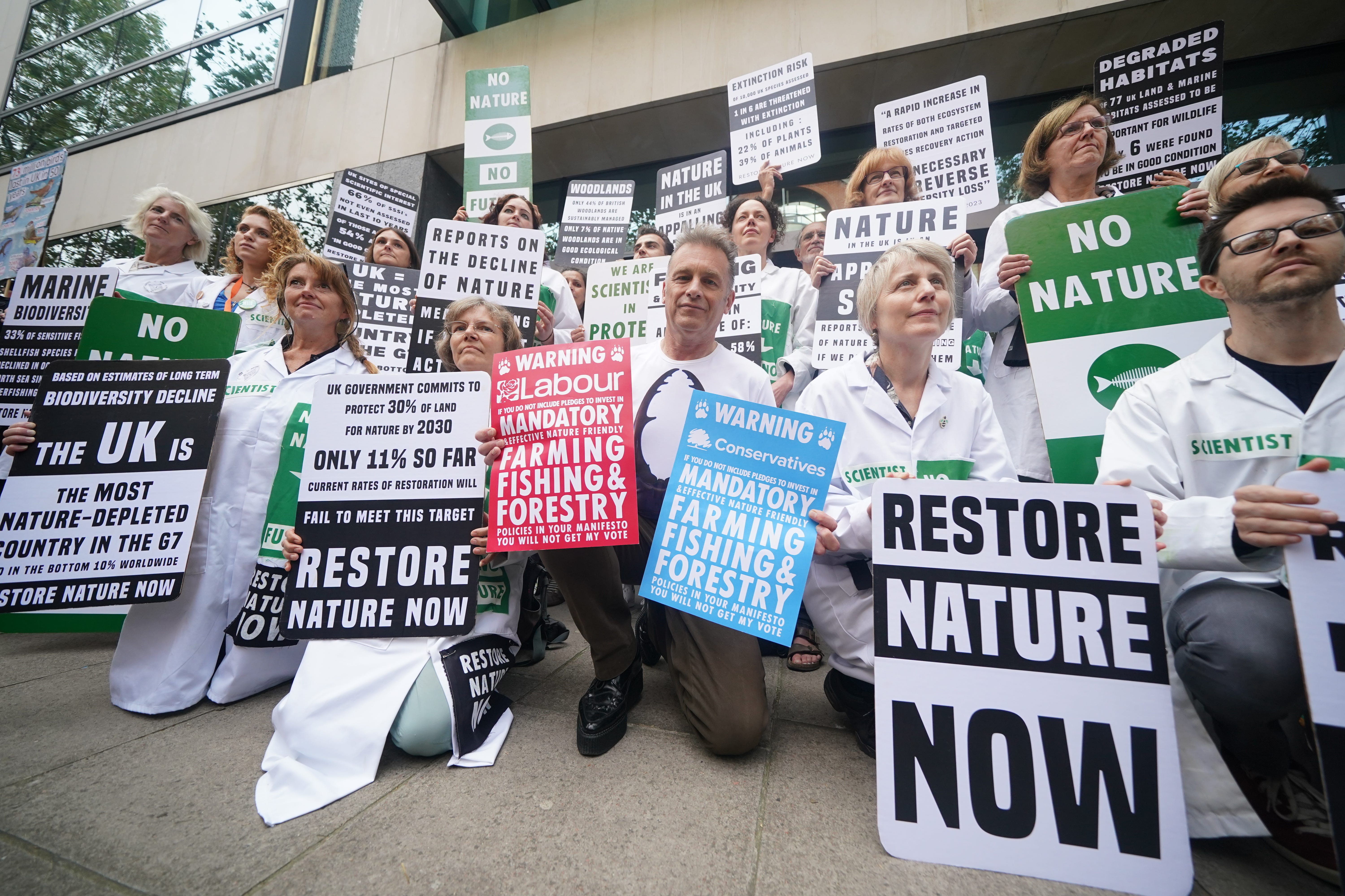 TV presenter and environmentalist Chris Packham with scientists protesting in central London in response to the State of Nature report last September (Yui Mok/PA)