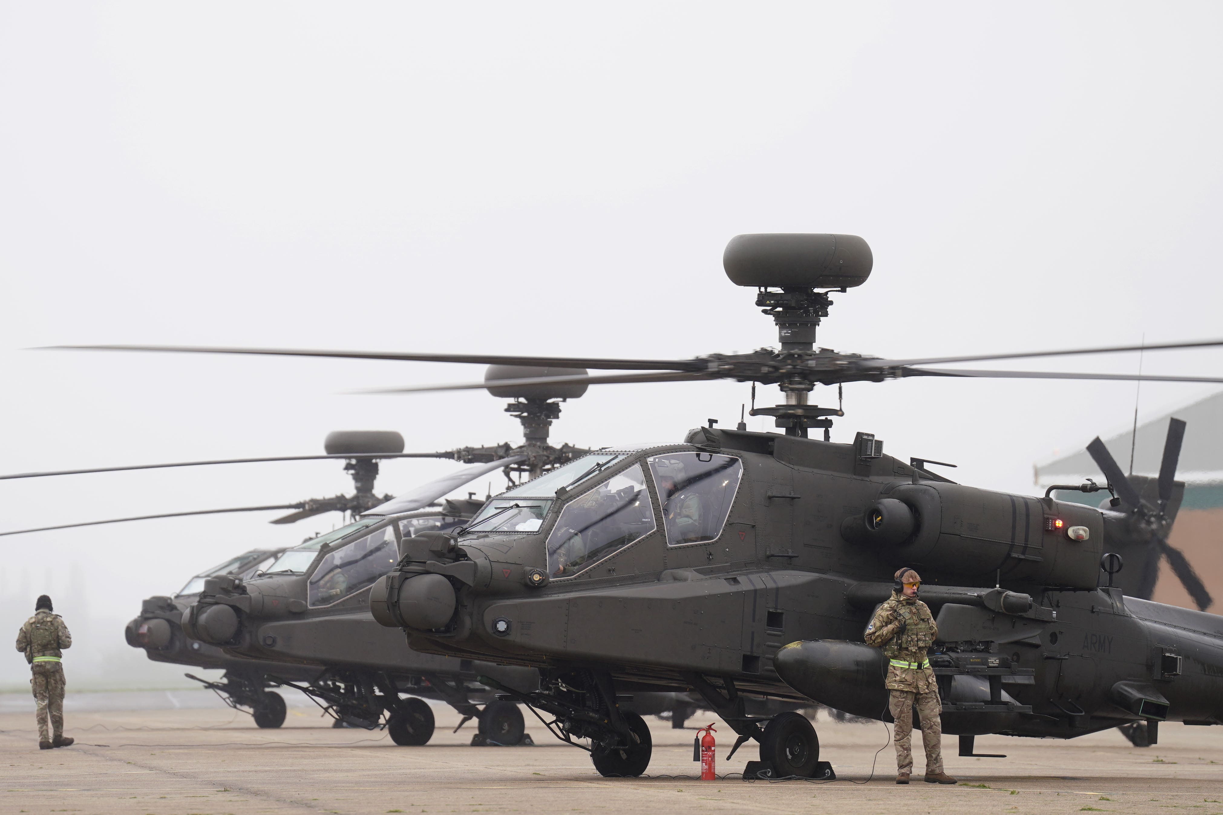 British Army Apache AH-64E attack helicopters at Wattisham Flying Station in Suffolk (Joe Giddens/PA)