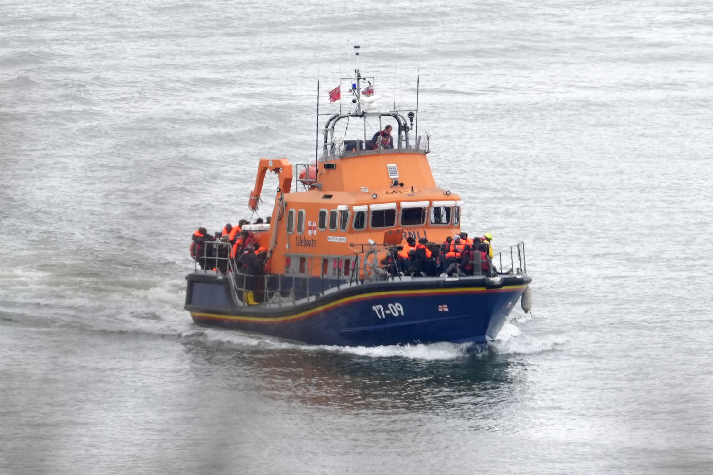 Three people have been arrested on suspicion of immigration offences after five migrants including a child died while trying to cross the Channel (Gareth Fuller/PA)