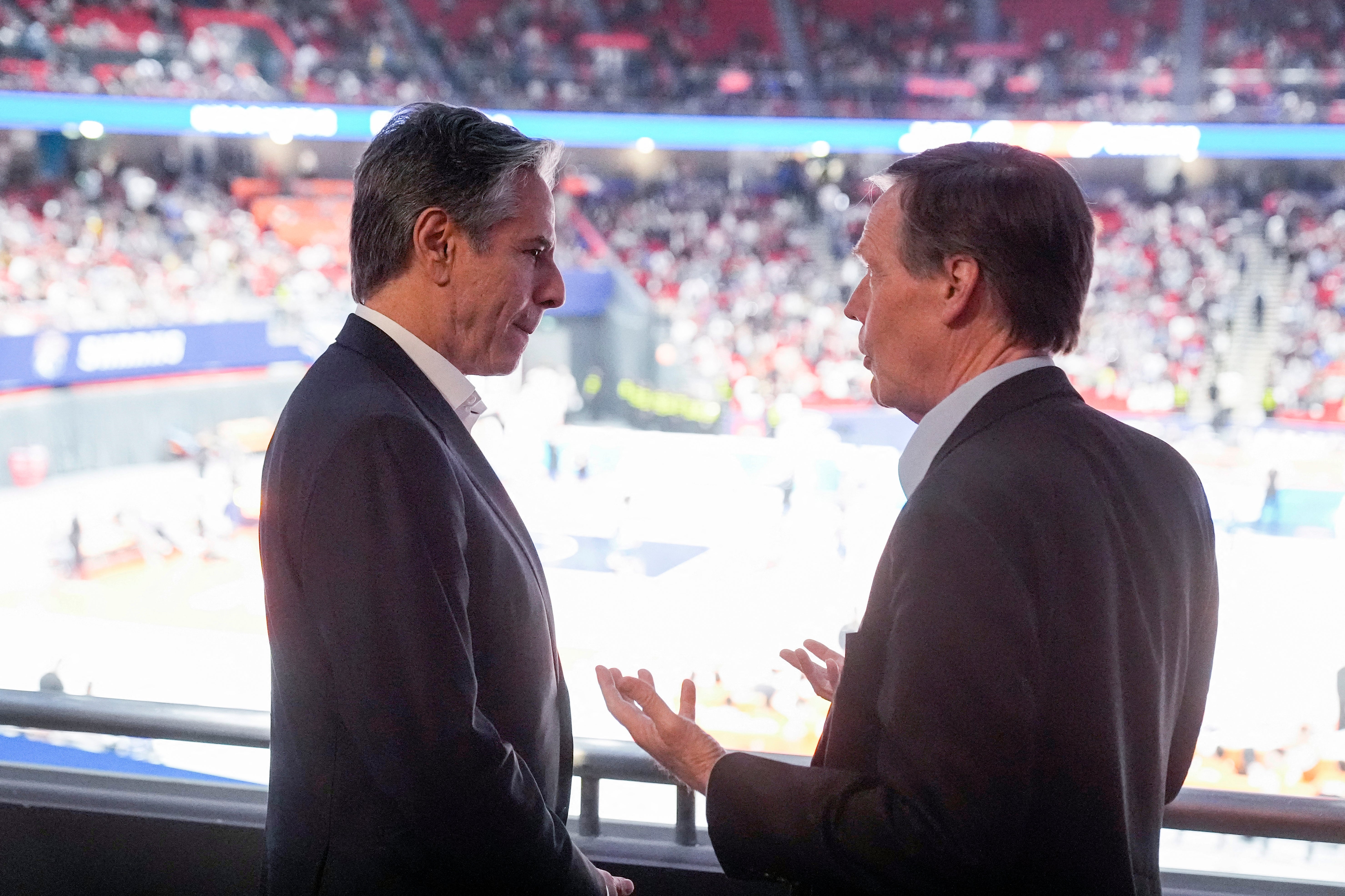 Antony Blinken and US ambassador to China Nicholas Burns attend a basketball game between the Shanghai Sharks and the Zhejiang Golden Bulls