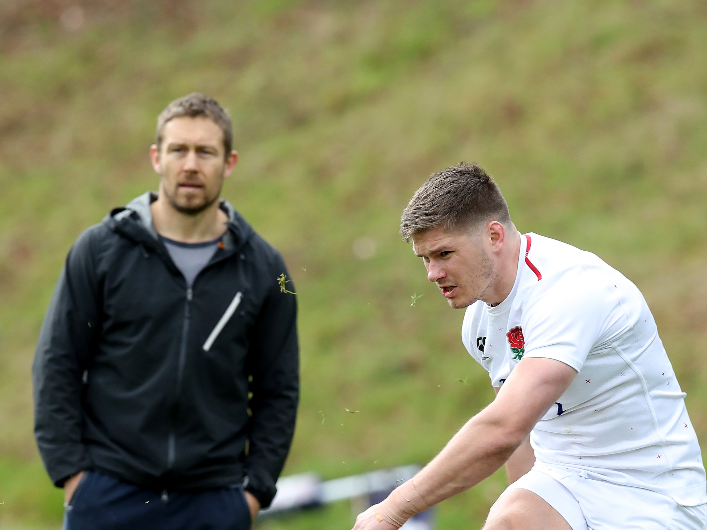 Owen Farrell practises kicking with Jonny Wilkinson