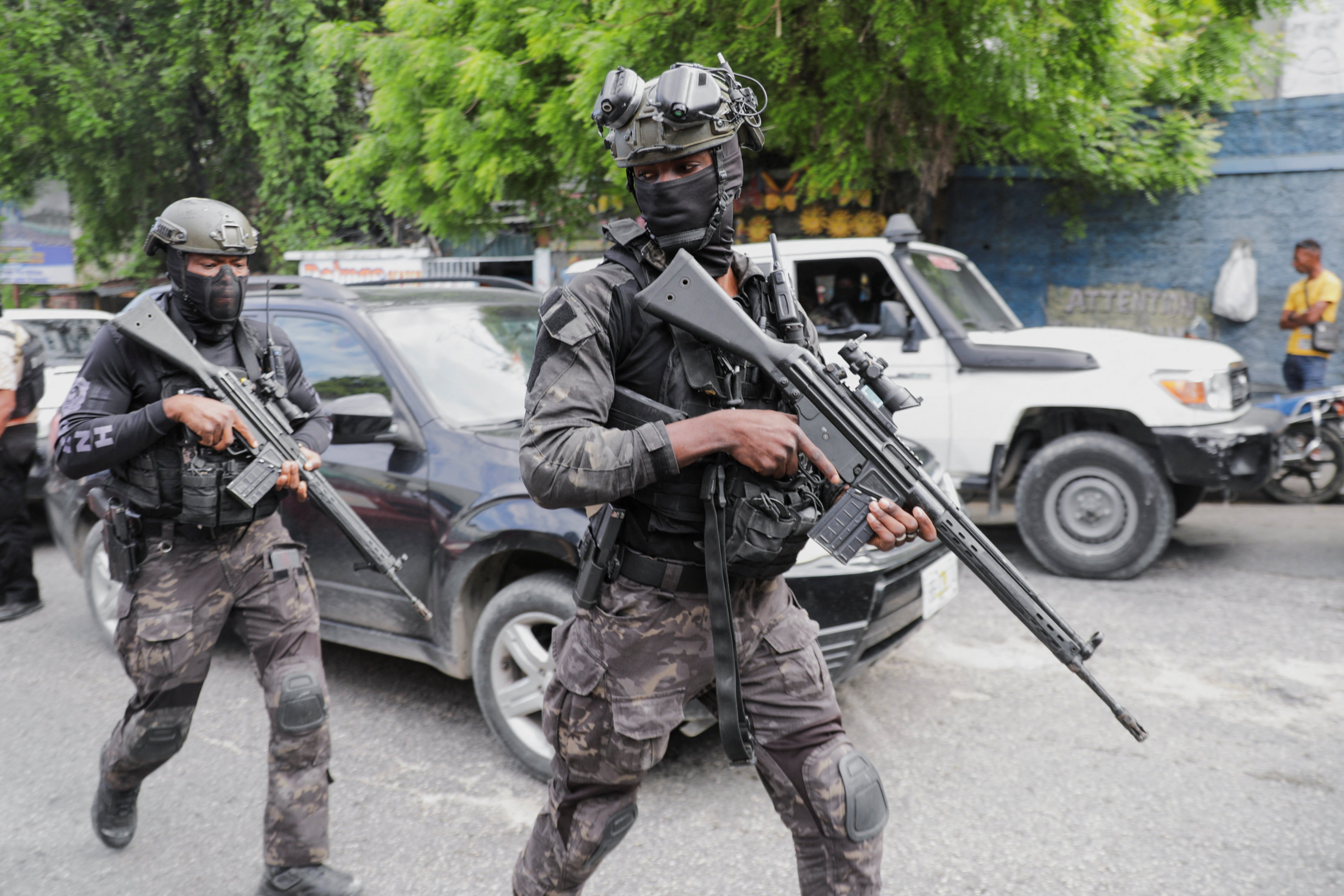 Security personnel patrols near the Villa d’Accueil where Haiti’s transition council will be installed, on the outskirts of Port-au-Prince