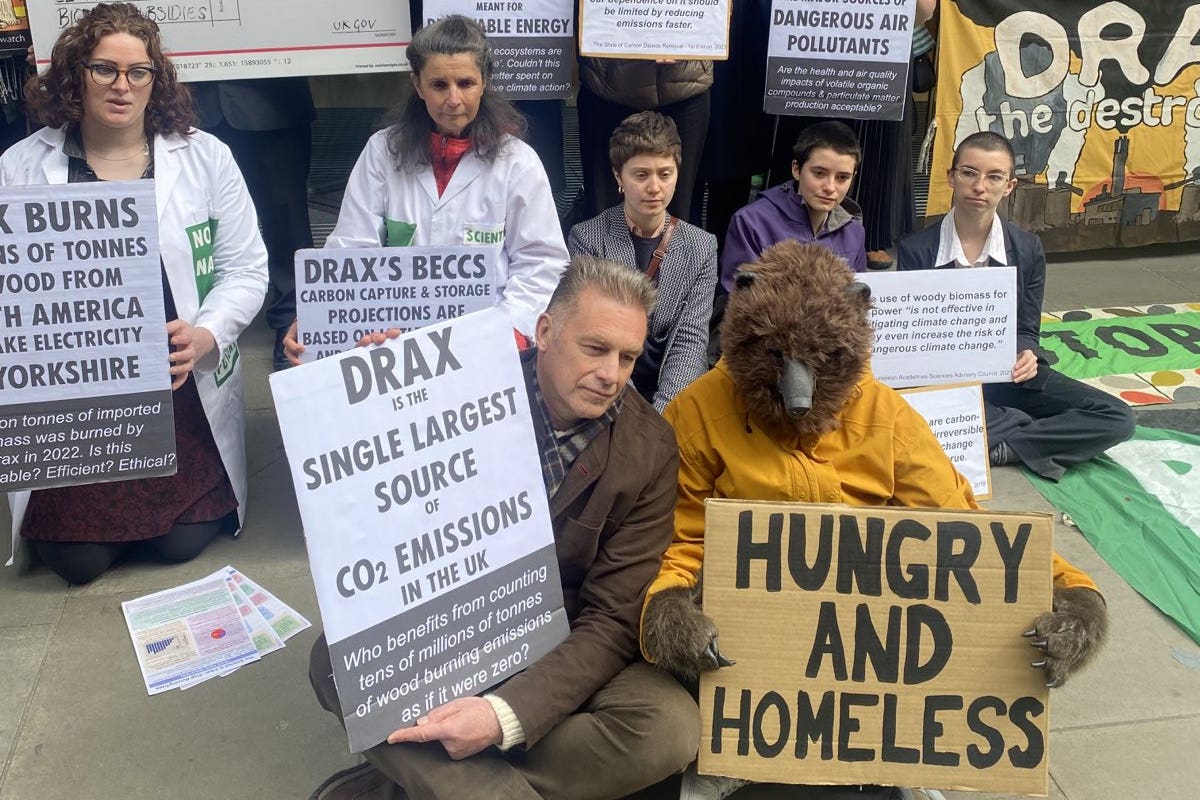 Broadcaster Chris Packham and members of the Axe Drax campaign group protesting outside the Drax AGM (Merry Dickinson/PA)