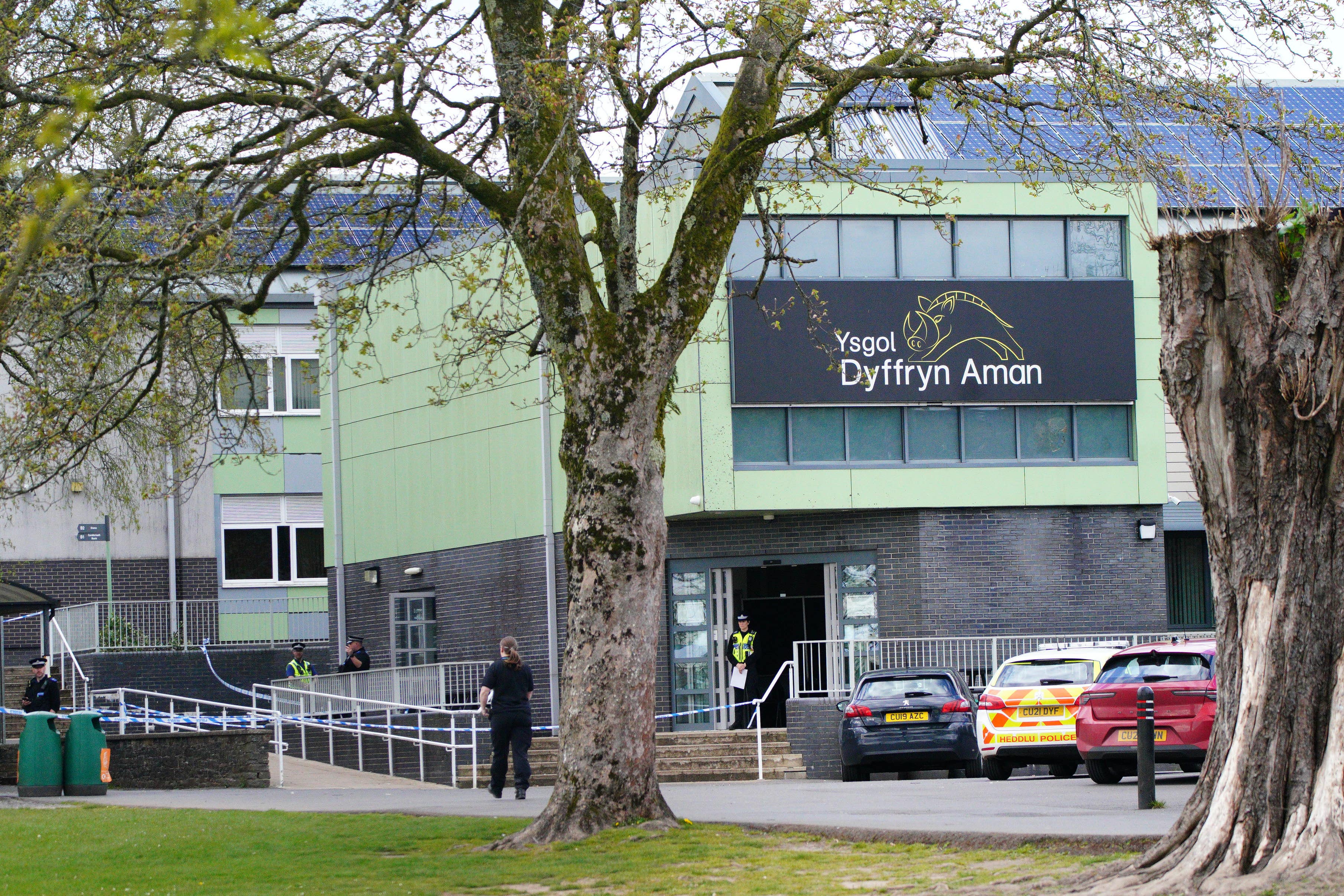 Police at Amman Valley school, in Ammanford (Ben Birchall/PA)