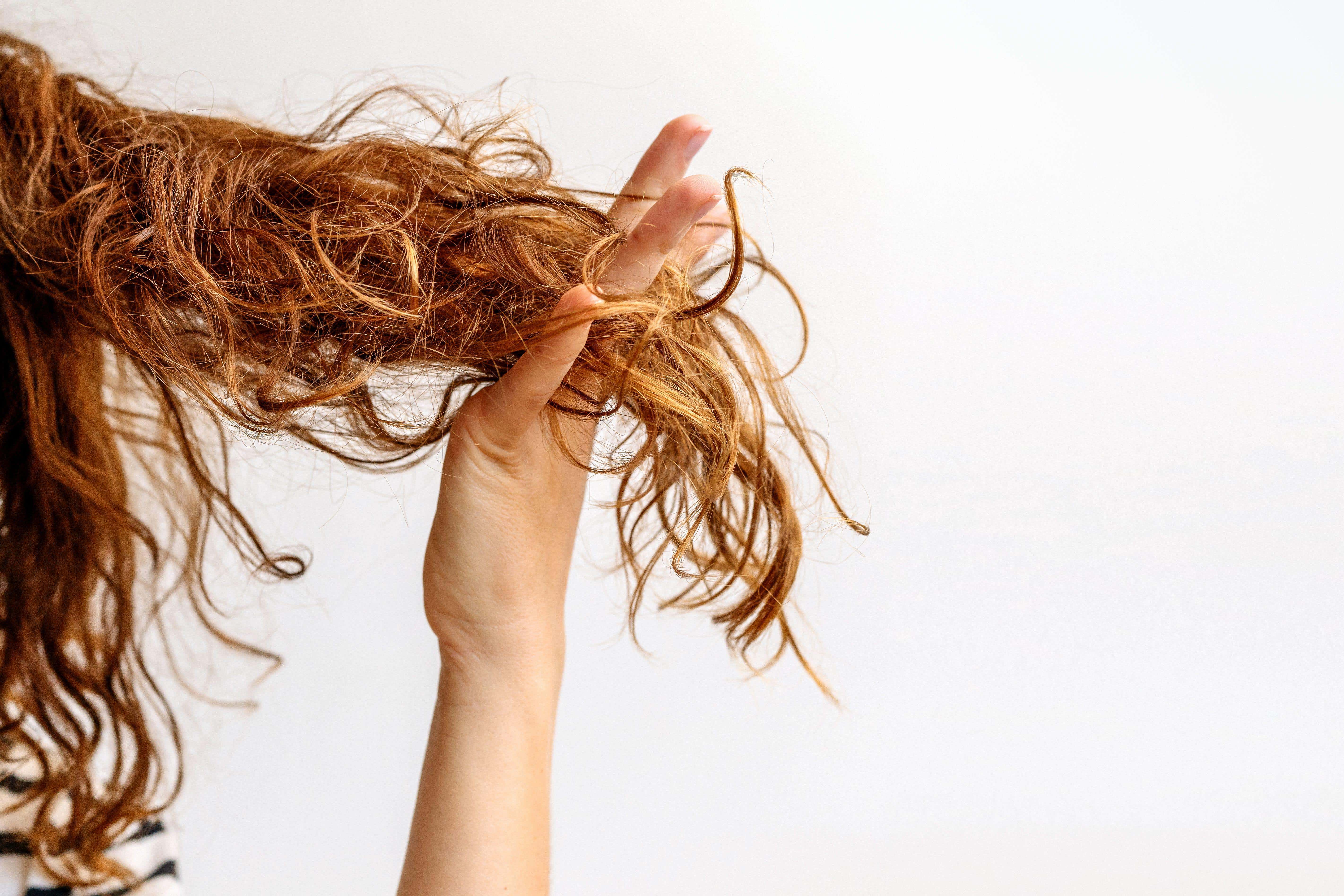 Hard water can cause your hair to become dry and brittle (Alamy/PA)