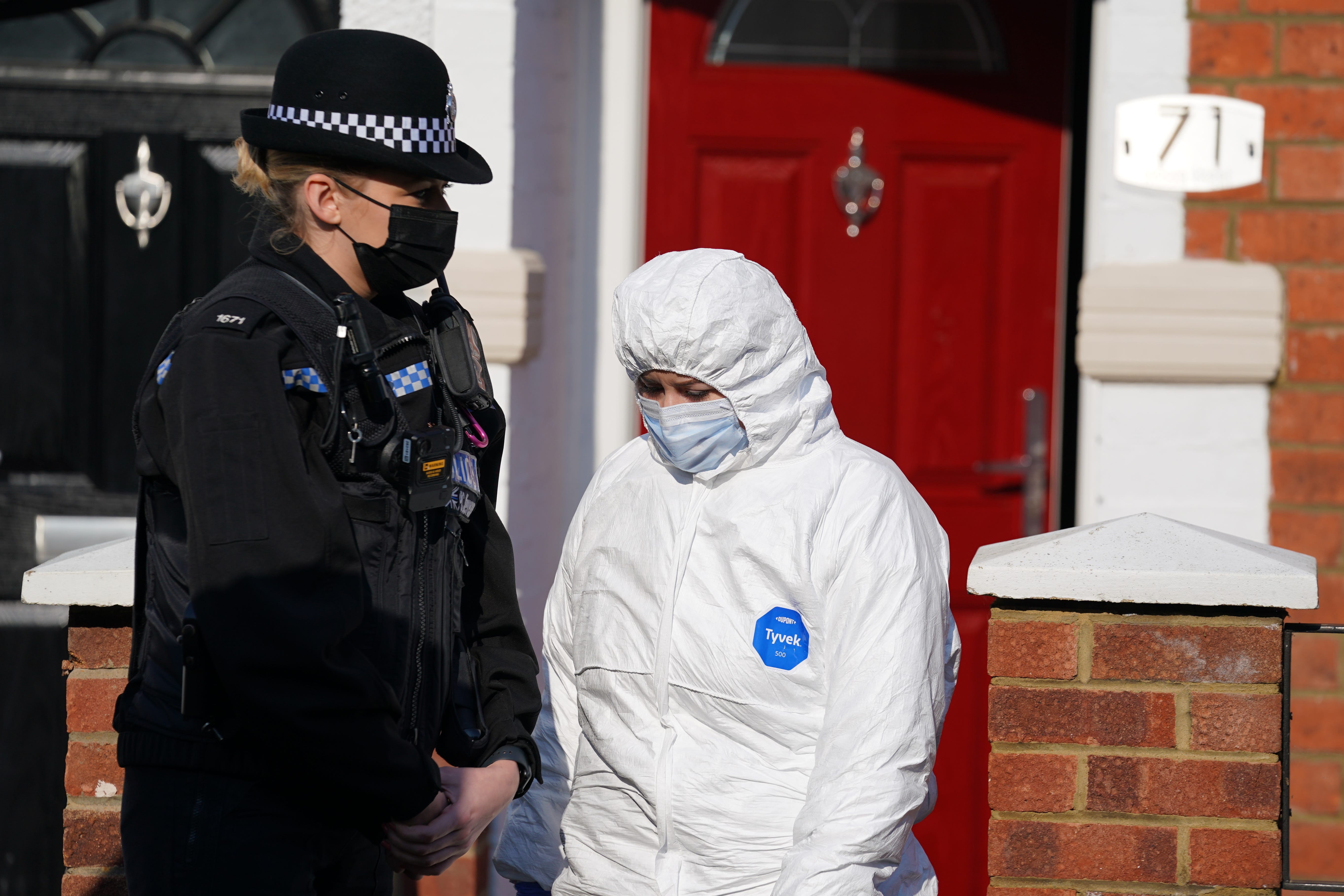 Forensic officers at the scene in Moore Street, Kingsley, Northampton (Jacob King/PA)