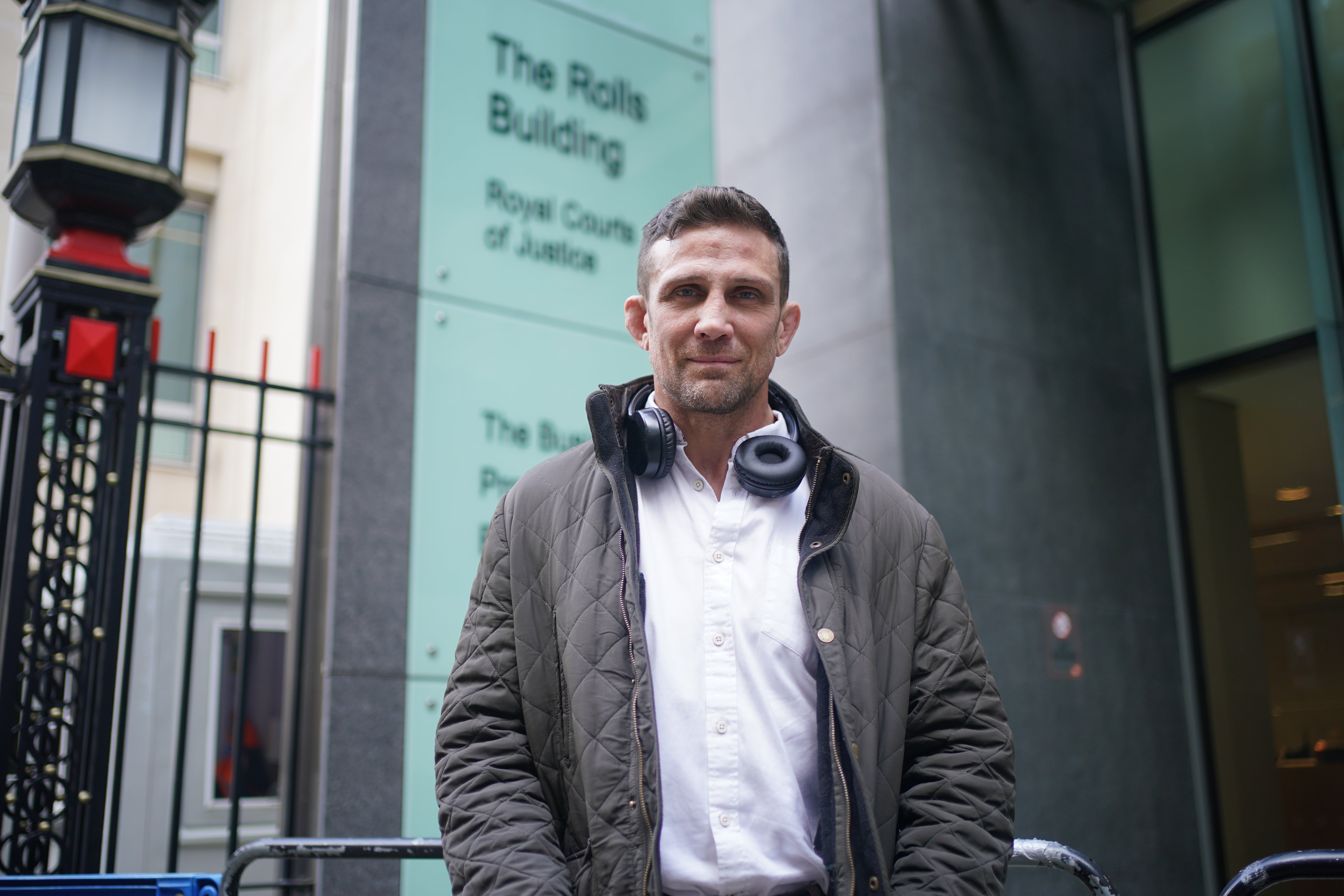 Alex Reid leaving the Rolls Building in central London after attending a bankruptcy hearing for his former partner Katie Price