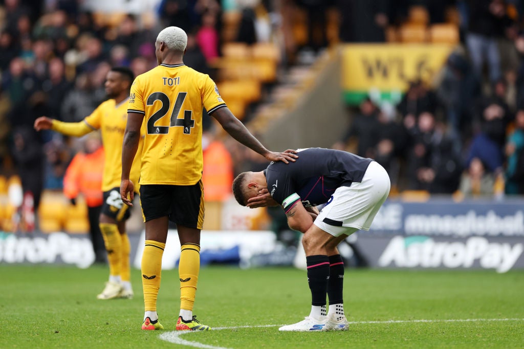 Carlton Morris of Luton Town is consoled by Toti Gomes