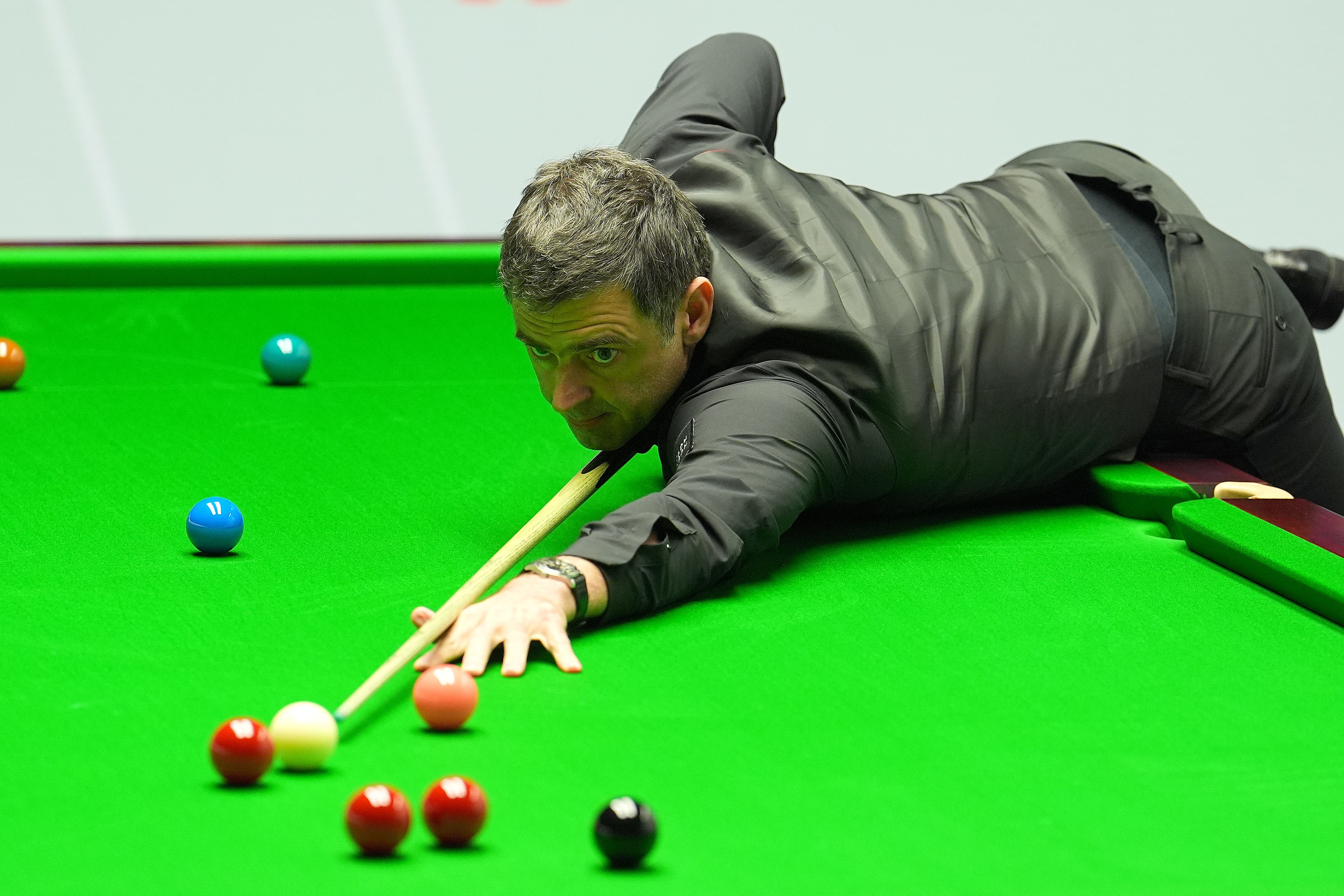 Ronnie O’Sullivan leads Ryan Day at the World Championship (Martin Rickett/PA)