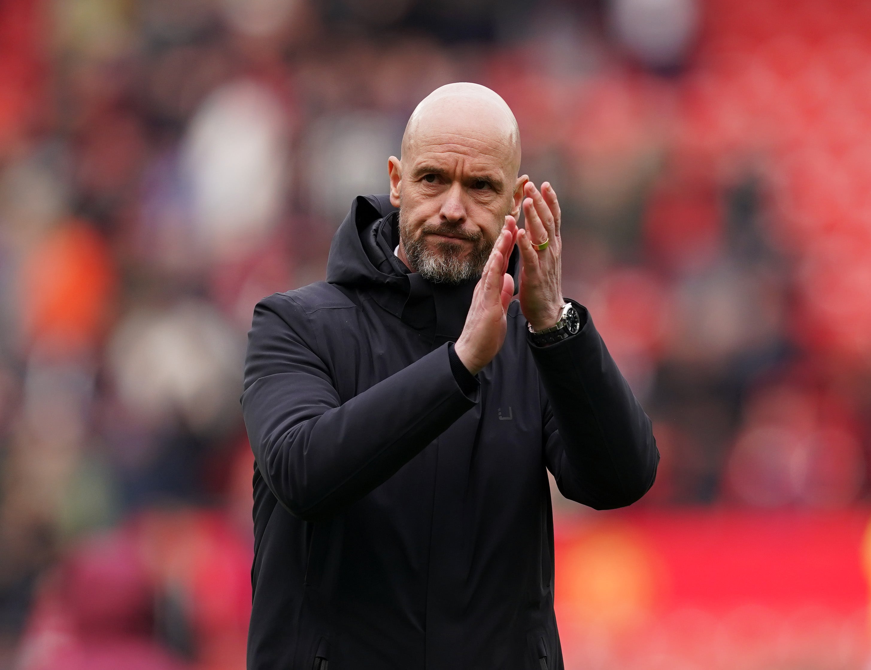 The under-fire Dutchman salutes the Manchester United crowd after a draw against Burnley