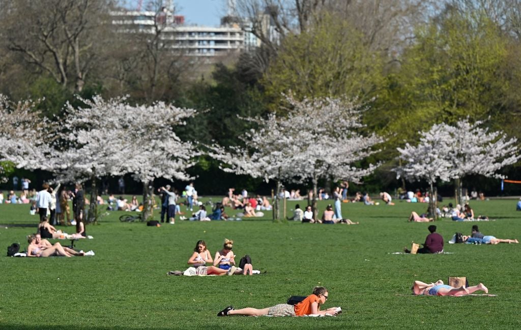 File photo: Londoners enjoy the sunshine in Battersea Park as the weather is set to get warmer