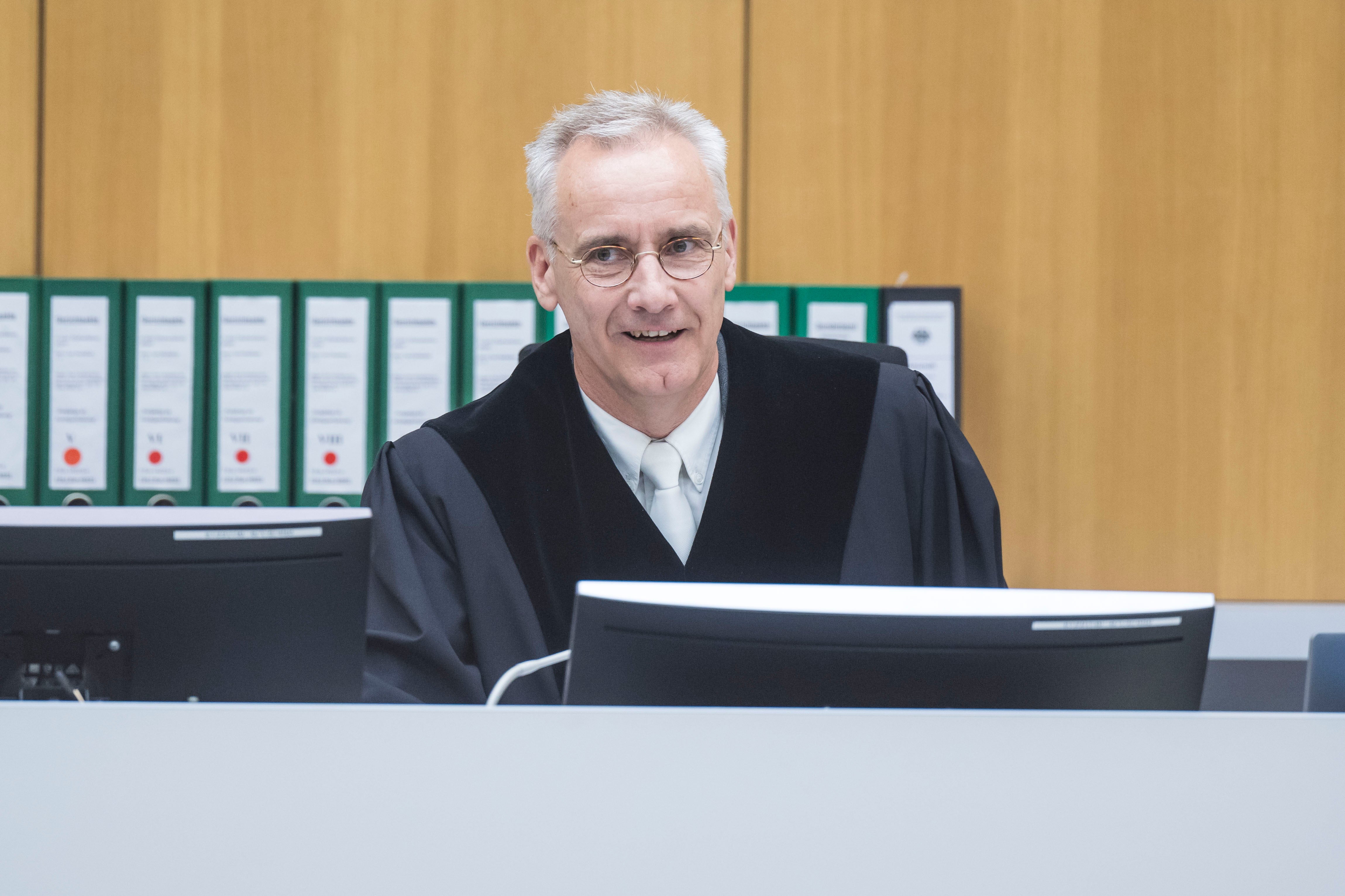 Presiding judge Joachim Holzhausen opens the first day of the trial