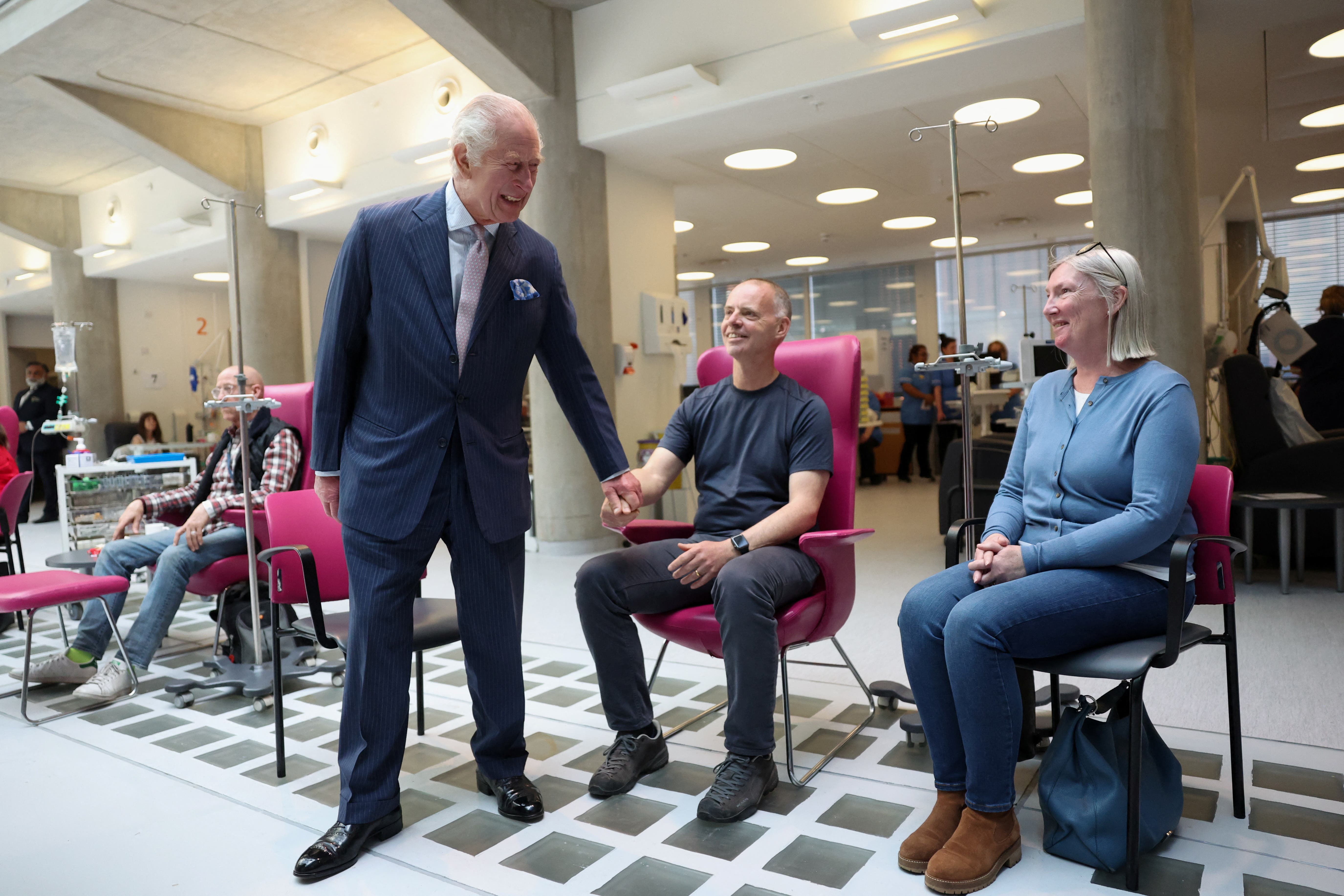 The King meets patients during a visit to University College Hospital Macmillan Cancer Centre (Suzanne Plunkett/PA)