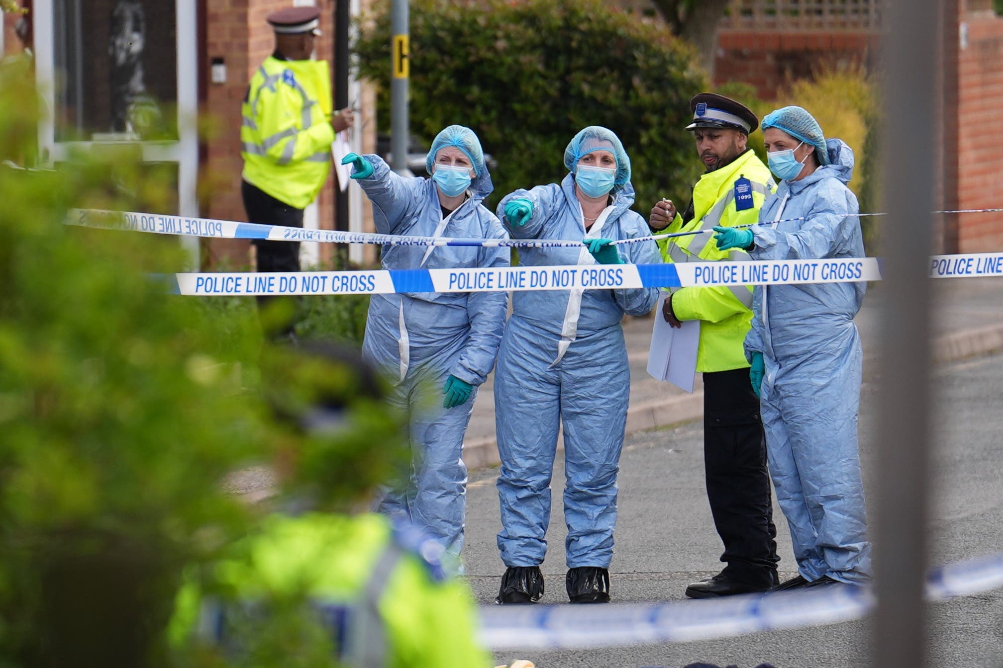 Forensic investigators in Laing Close, Hainault