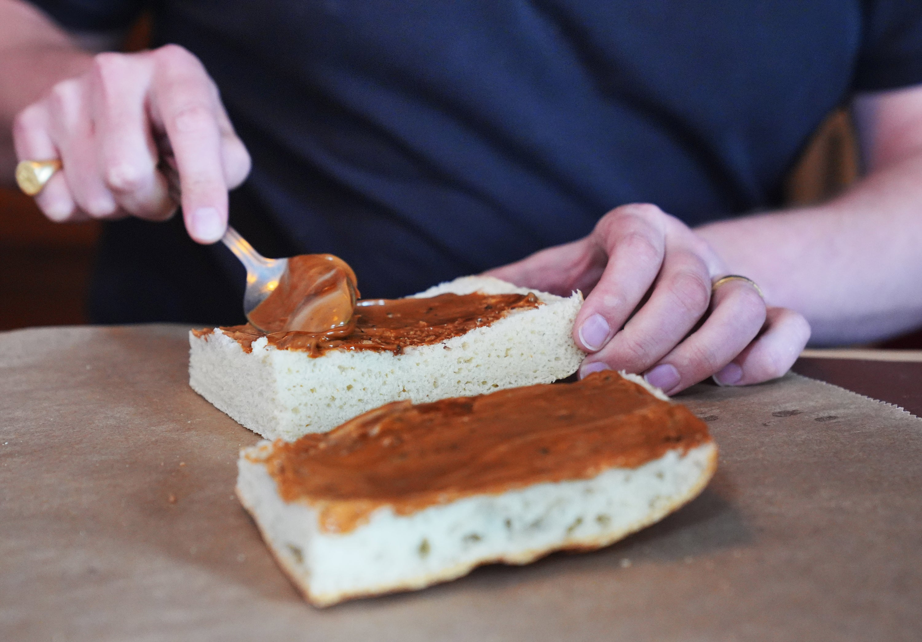 Max Halley spreading vegan mayonnaise on bread