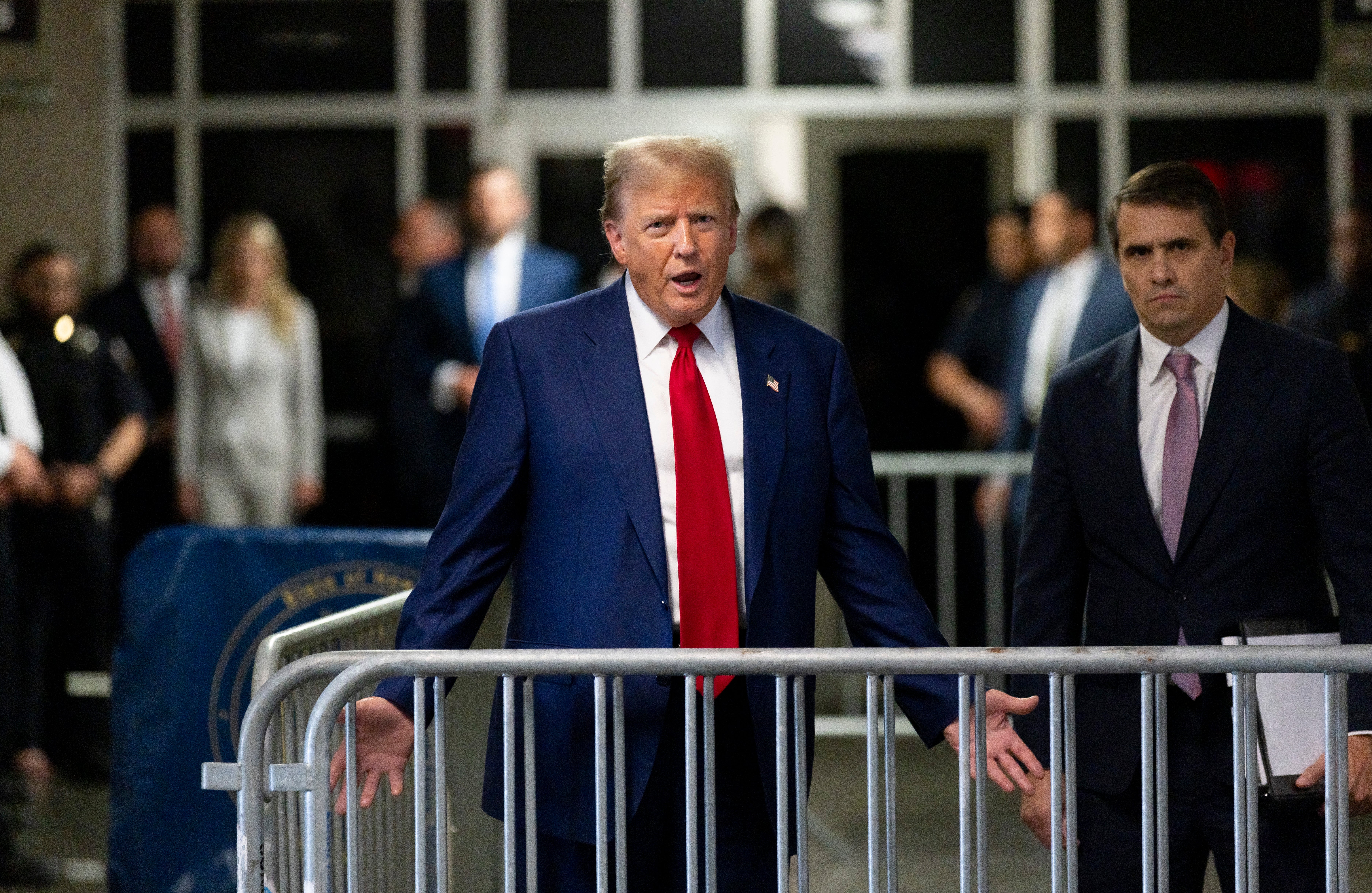 Donald Trump speaks to reporters in criminal court in Manhattan on 30 April