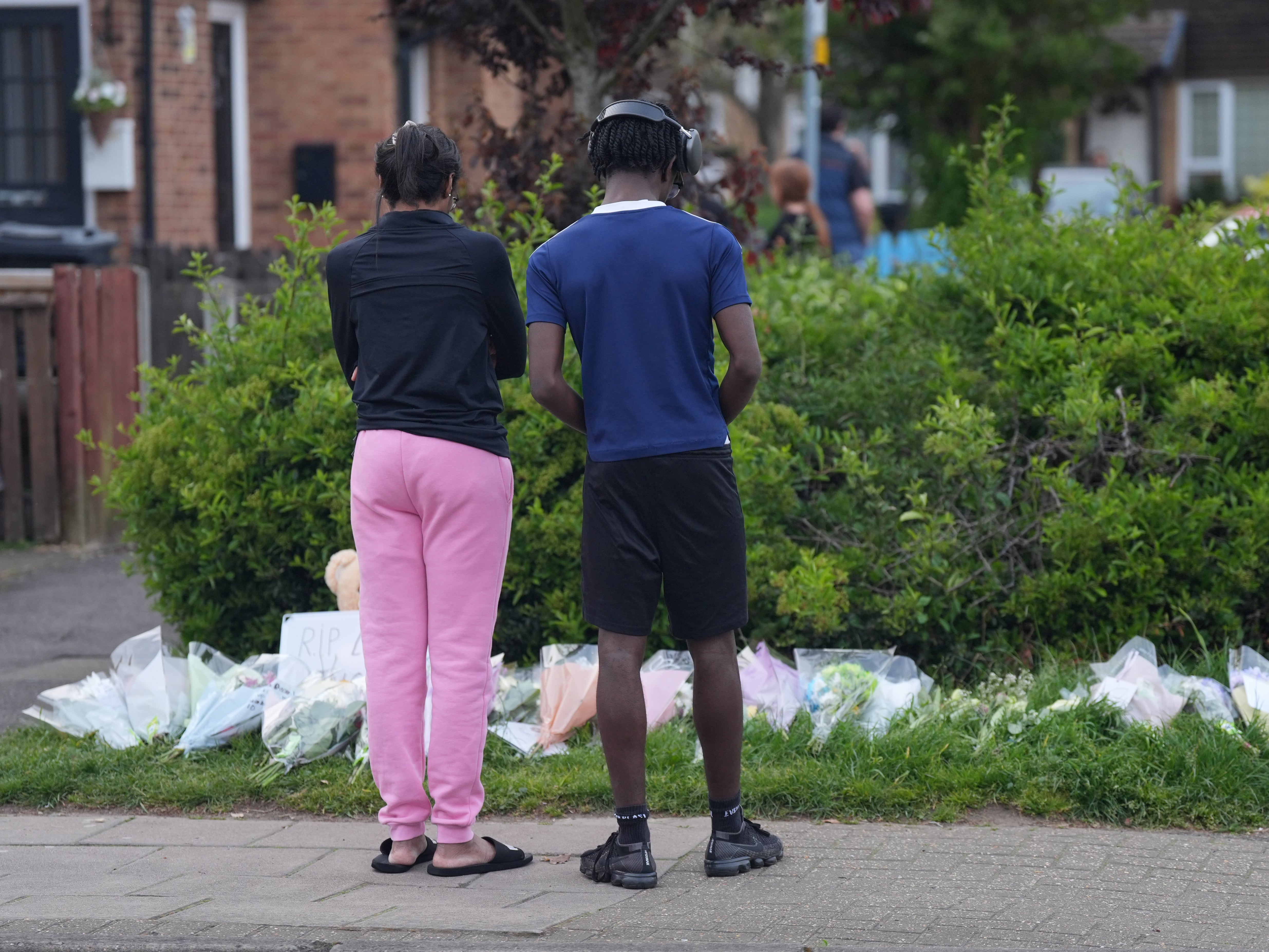 Floral tributes have been left at the scene in east London