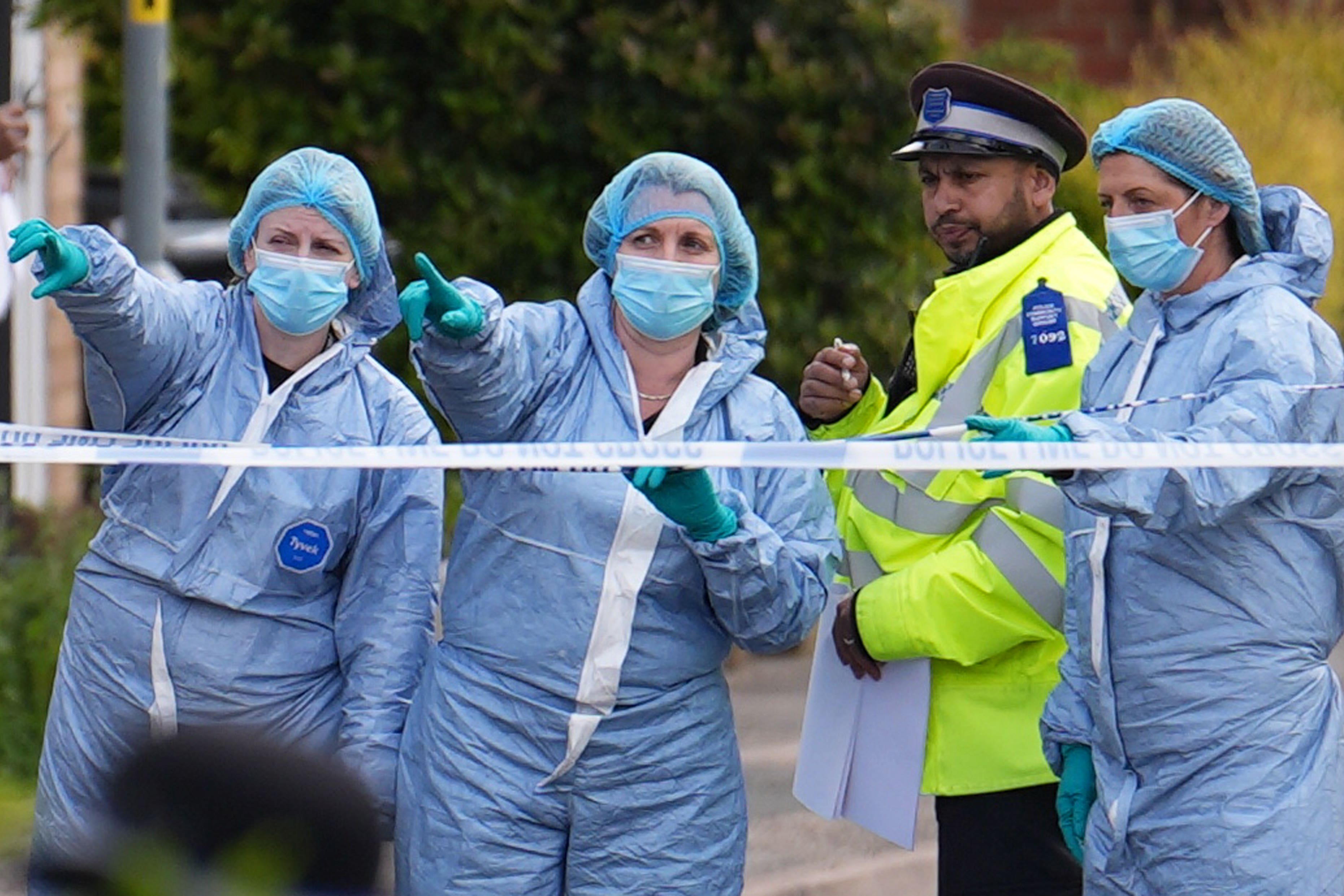 Forensic investigators in Laing Close in Hainault