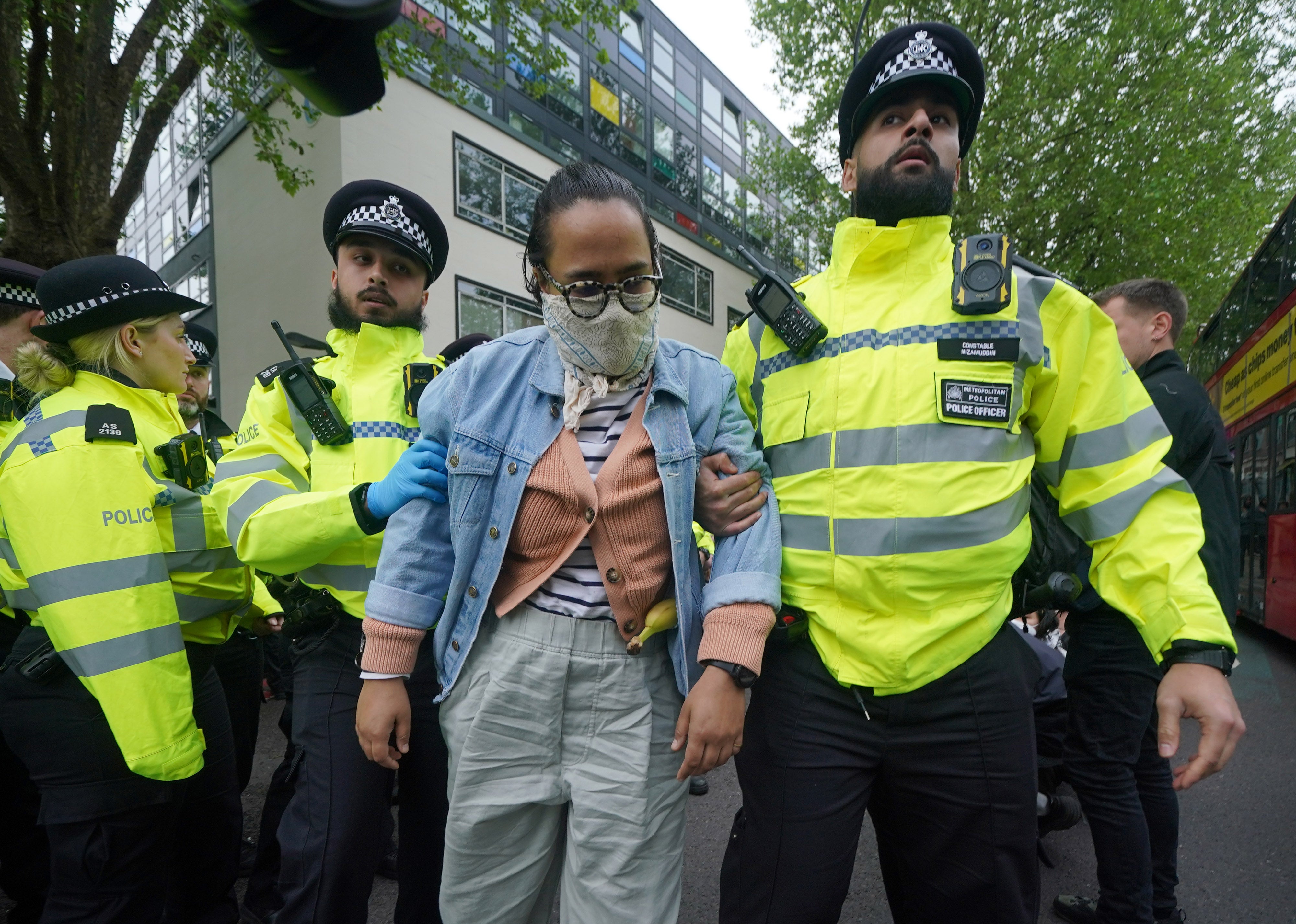 Officers were seen removing the protestors several hours after the action began