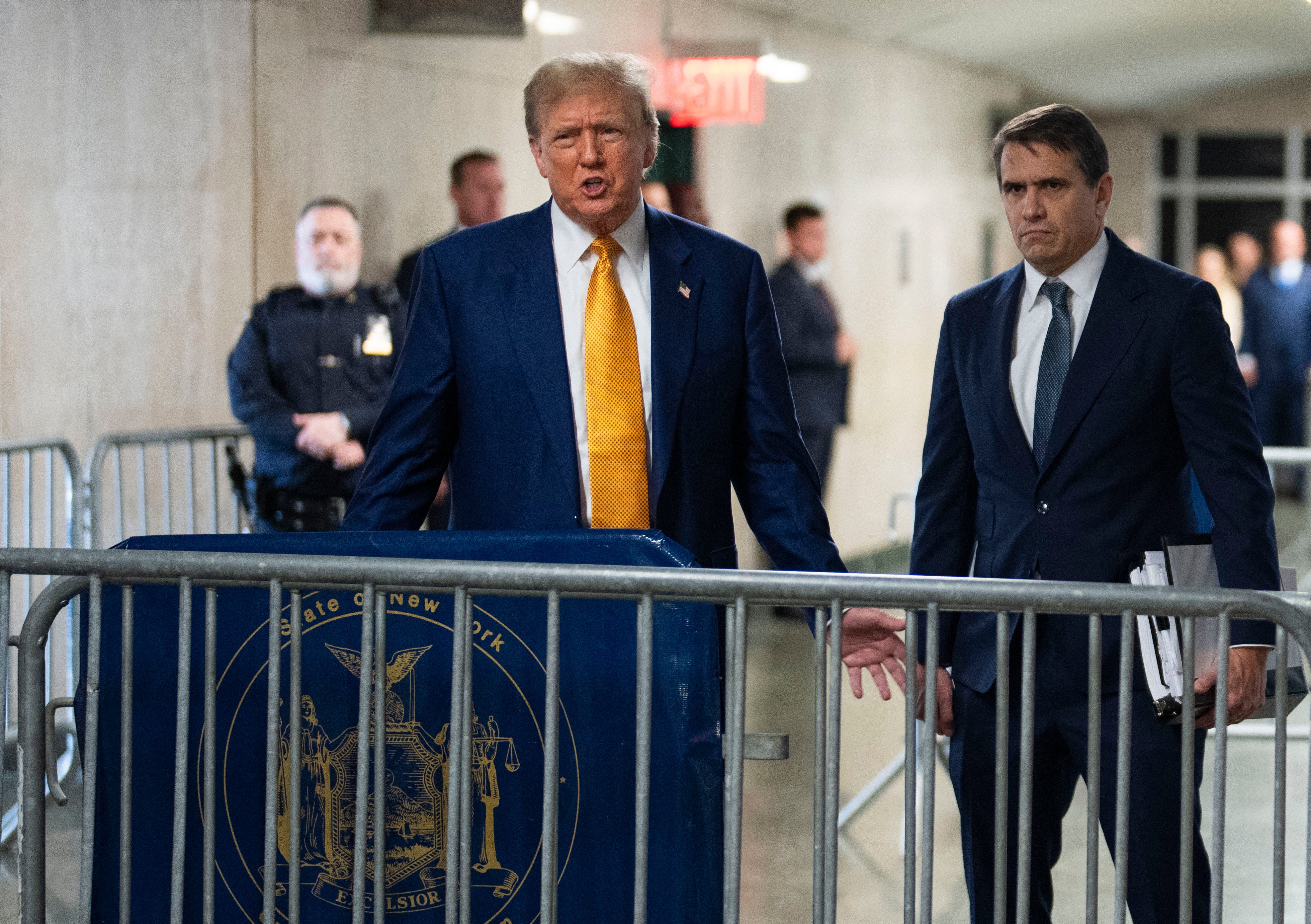 Donald Trump speaks to reporters in a Manhattan criminal courthouse on 2 May.