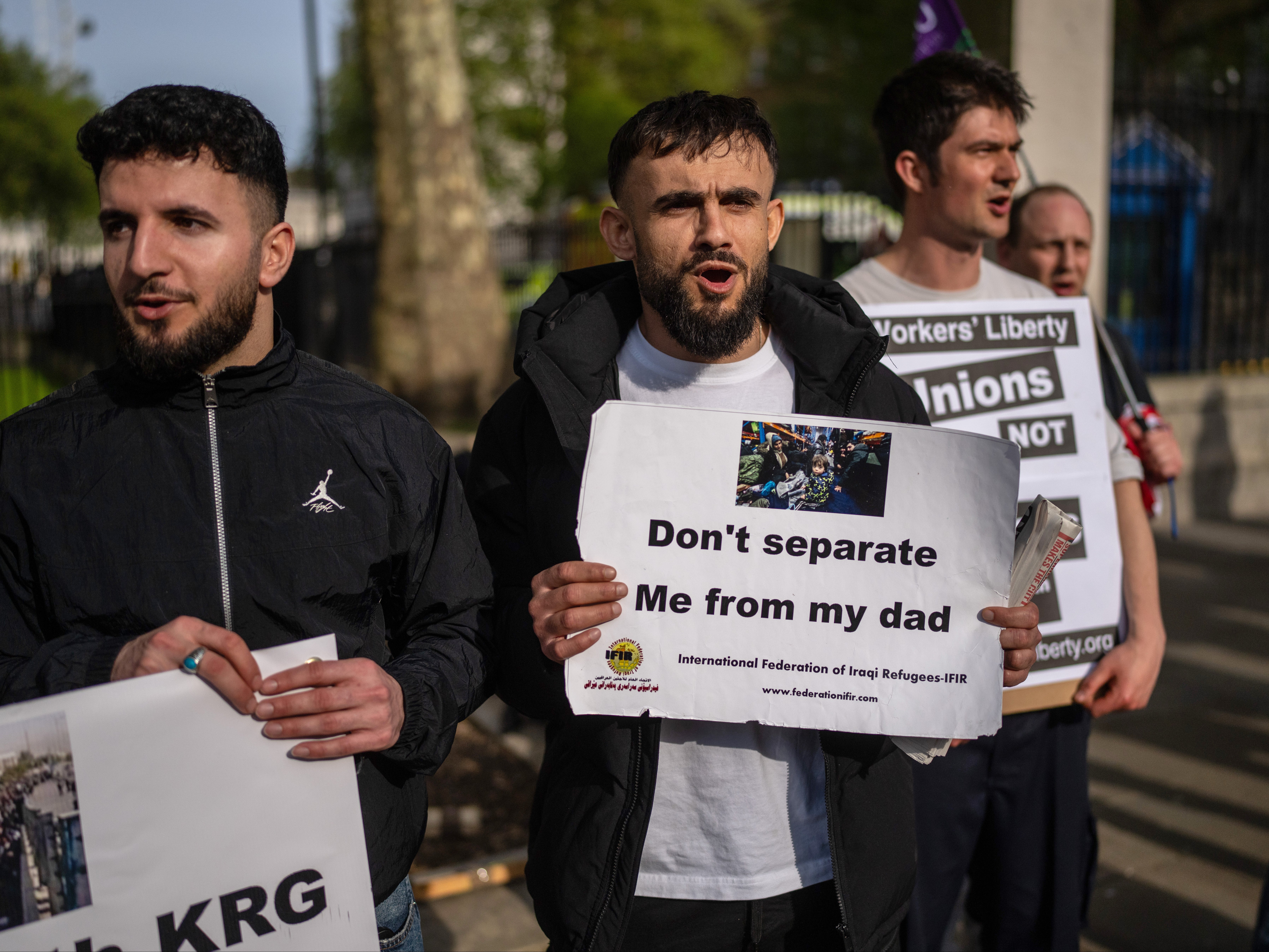 People protest against the Rwanda deportation bill outside Downing Street