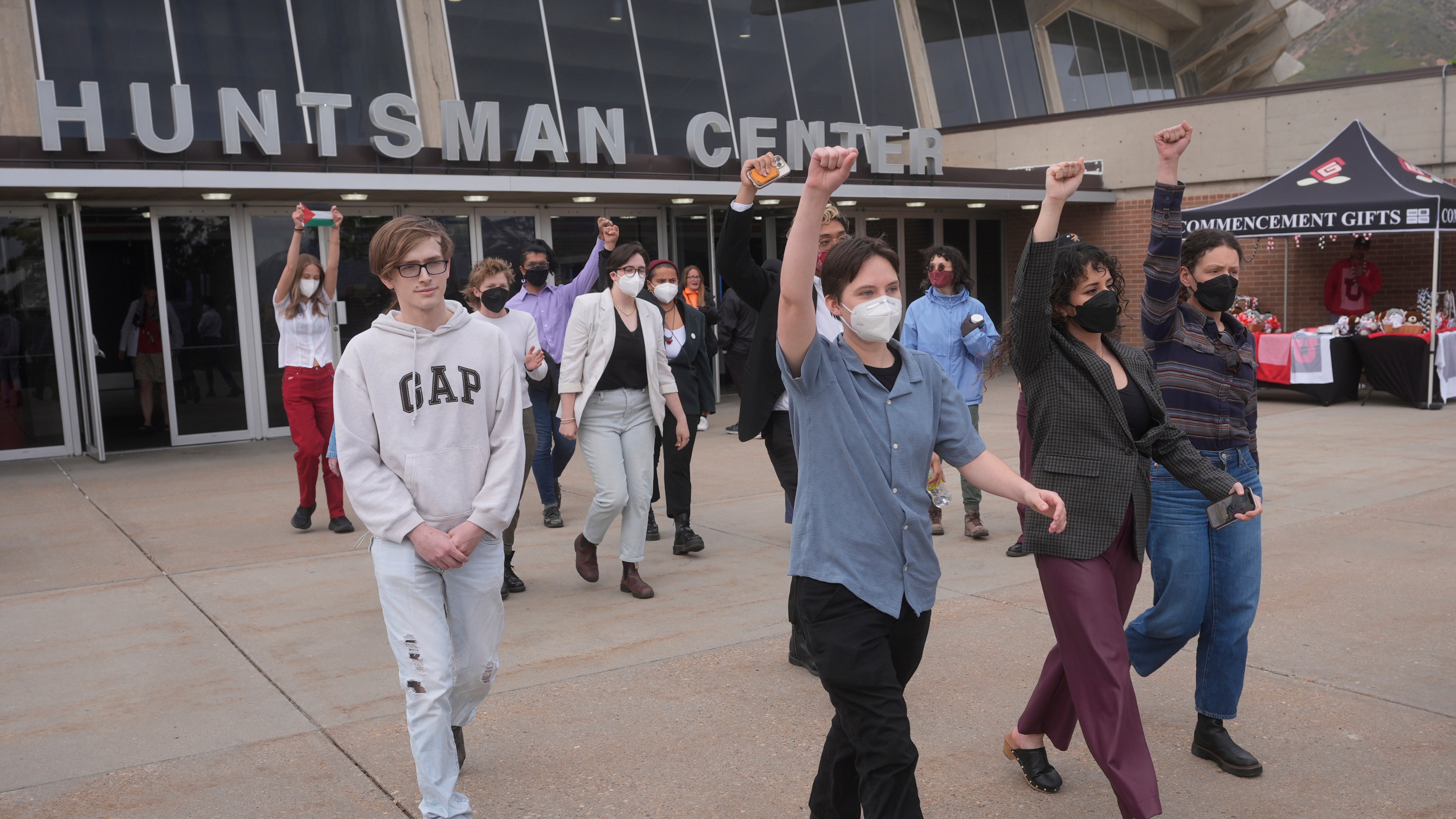 Protesters walk out during University of Utah graduation ceremonies at the Huntsman Center Thursday, May 2, 2024, in Salt Lake City. Some of those students then joined a group gathered outside, voicing their support for Palestine.