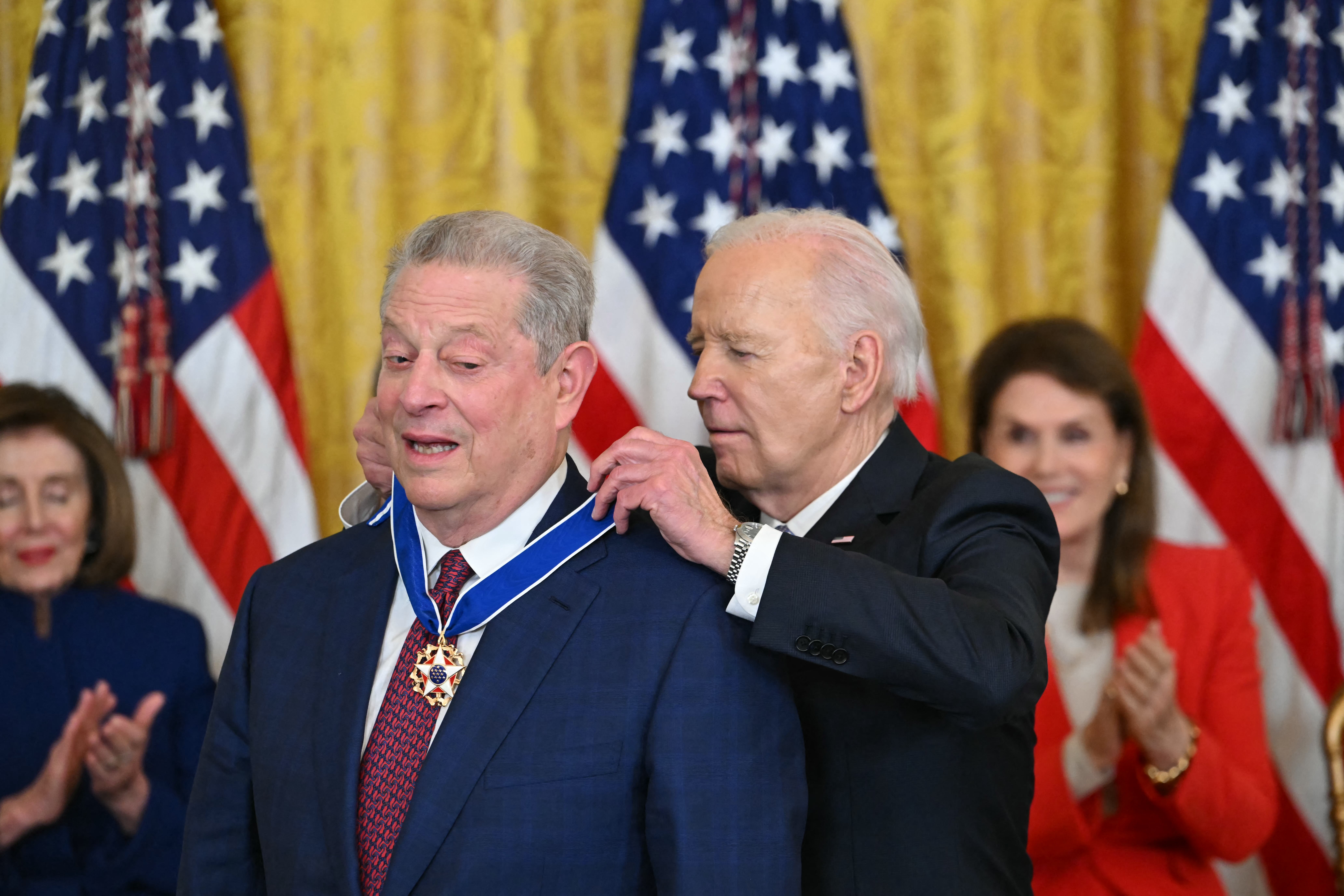 US President Joe Biden presents the Presidential Medal of Freedom to former US Vice President Al Gore in the East Room of the White House in Washington, DC, on 3 May 2024