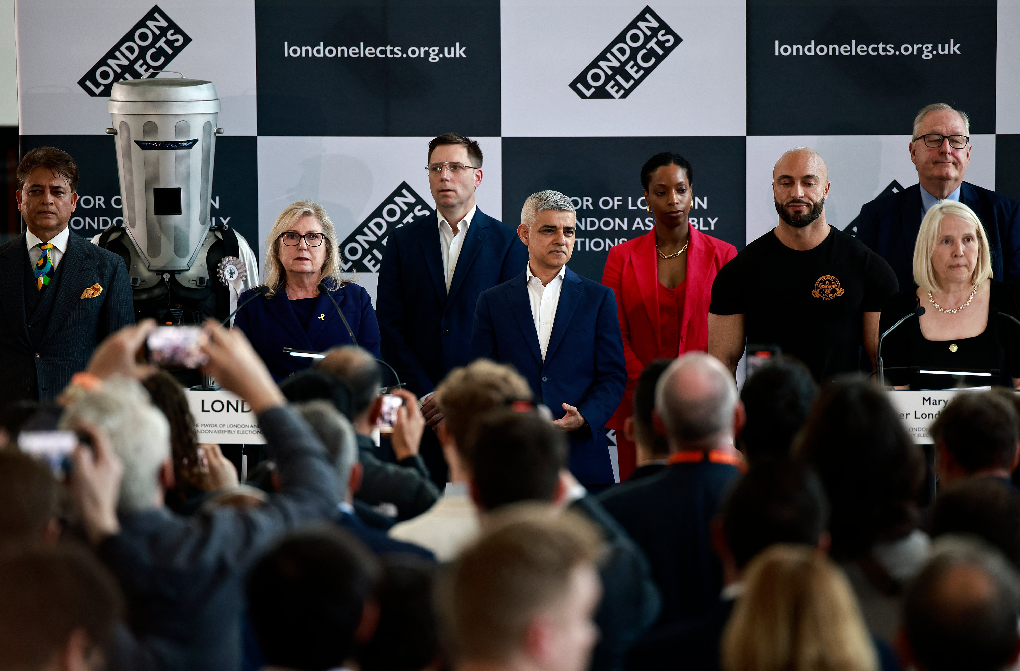 Re-elected Mayor of London Sadiq Khan stands with other mayoral candidates