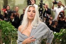 Kim Kardashian reveals why she wore grey cardigan to Met Gala after accessory confused fans