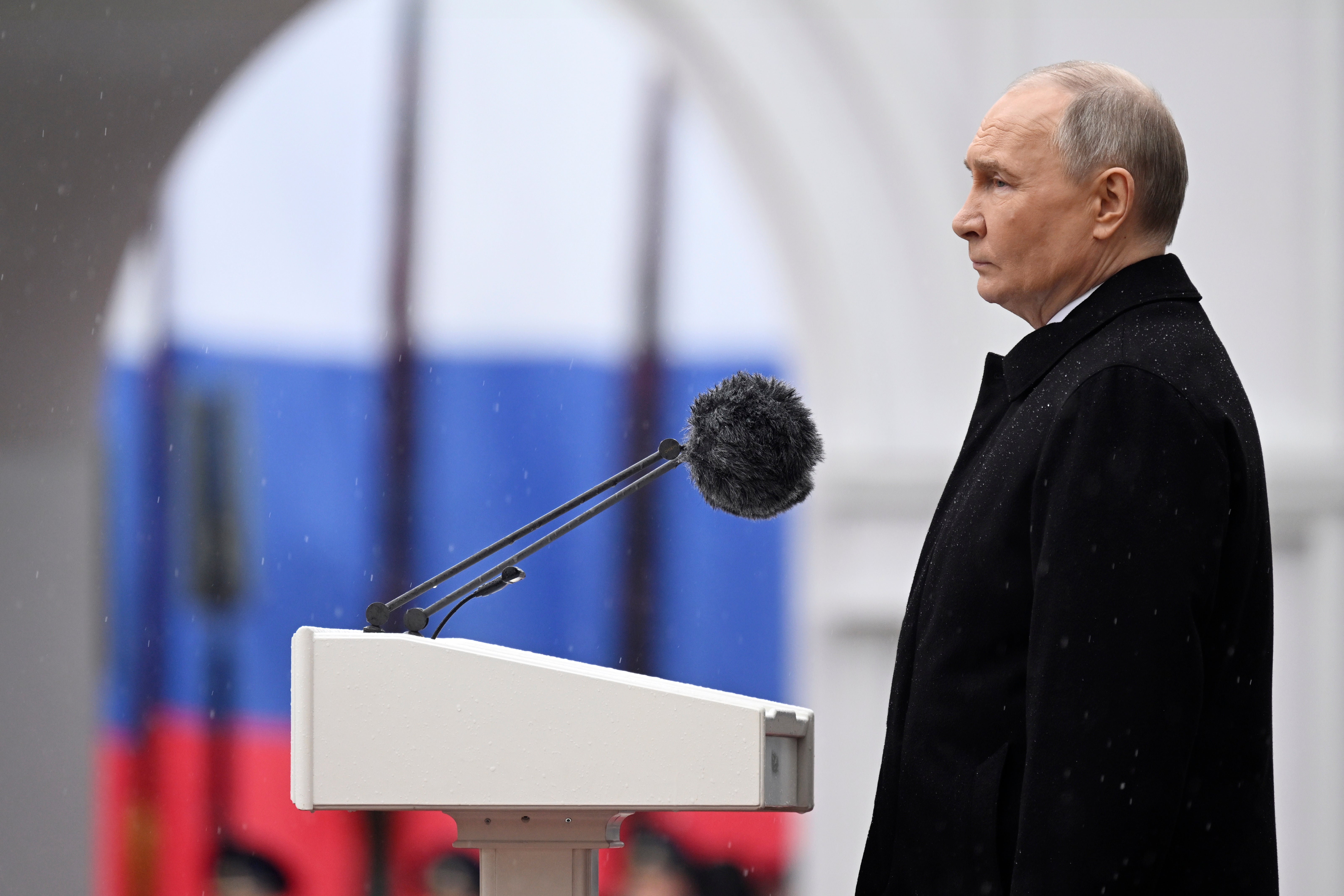 Russian President Vladimir Putin reviews honour guards of the Presidential regiment following his inauguration ceremony