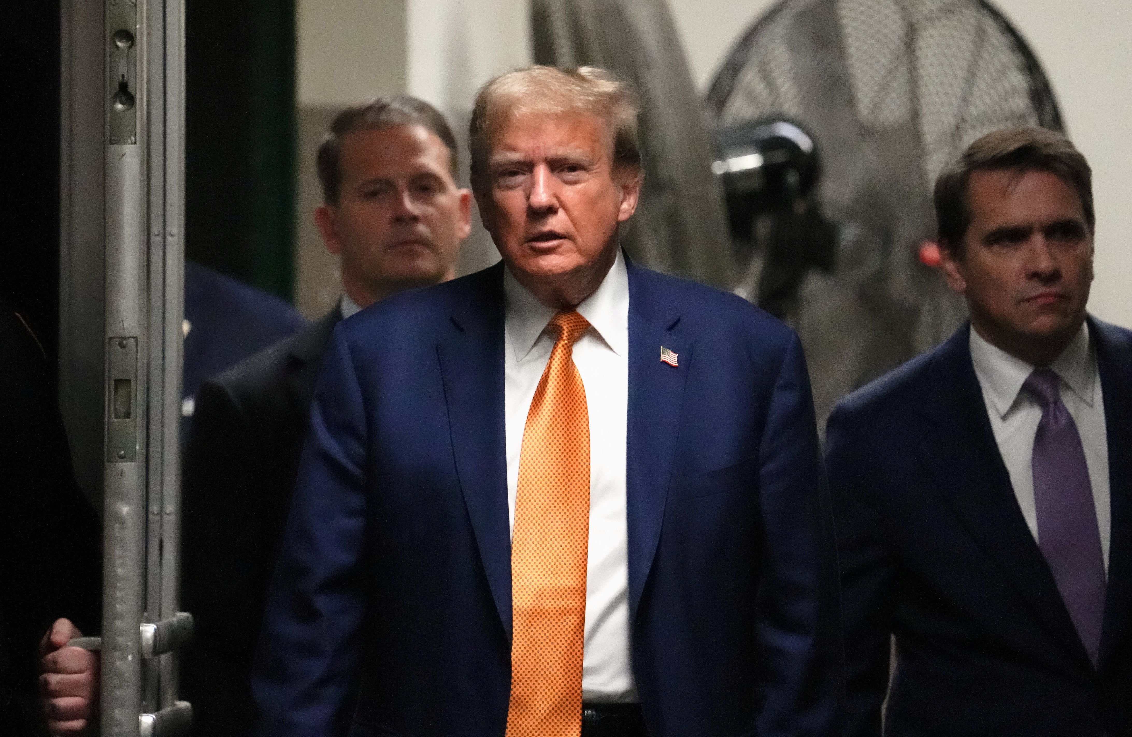 Donald Trump appears in a criminal courtroom in Manhattan on 7 May.