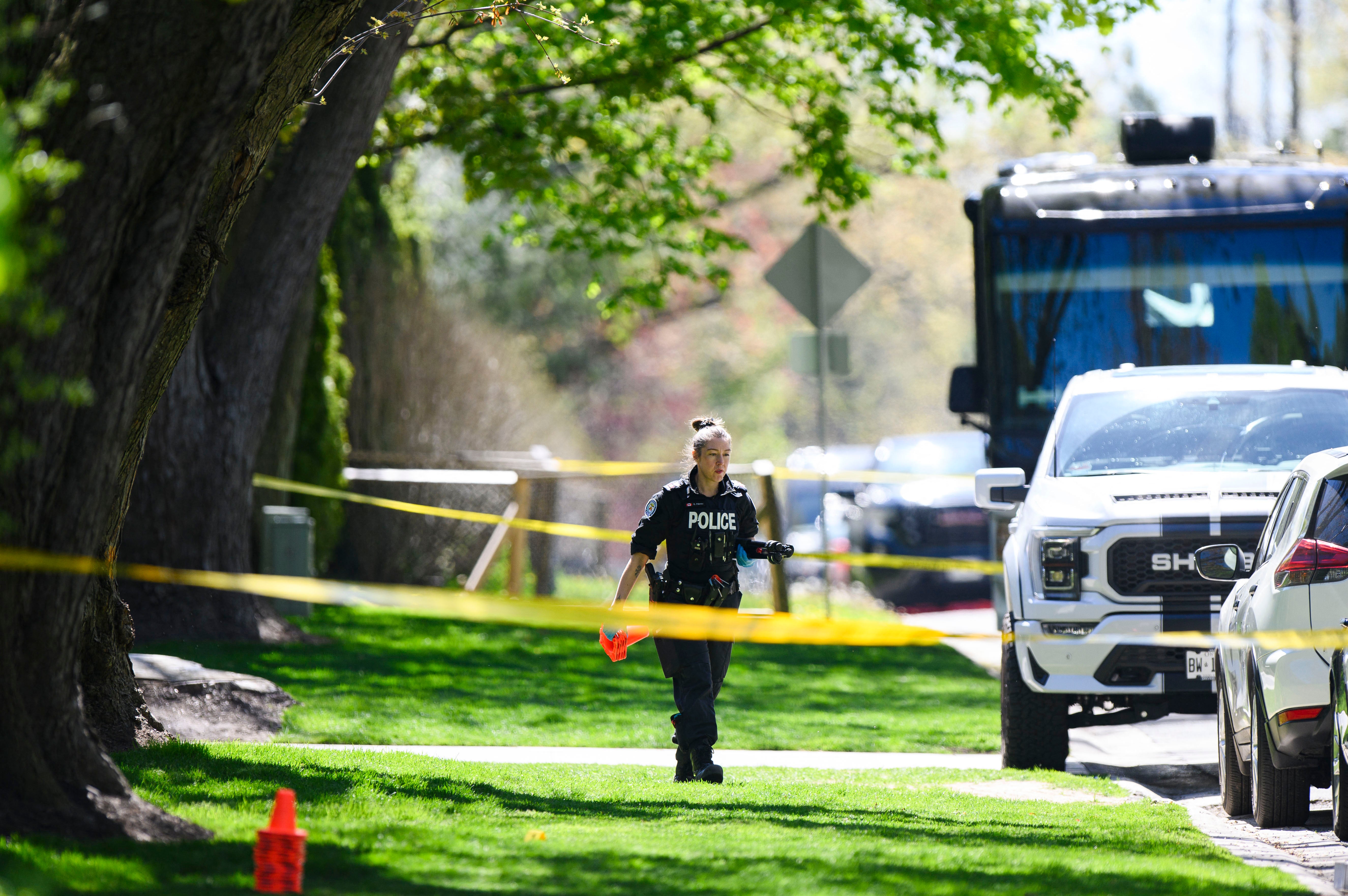 Toronto police patrol outside the home of Canadian rapper Drake after reports of a shooting early on Tuesday