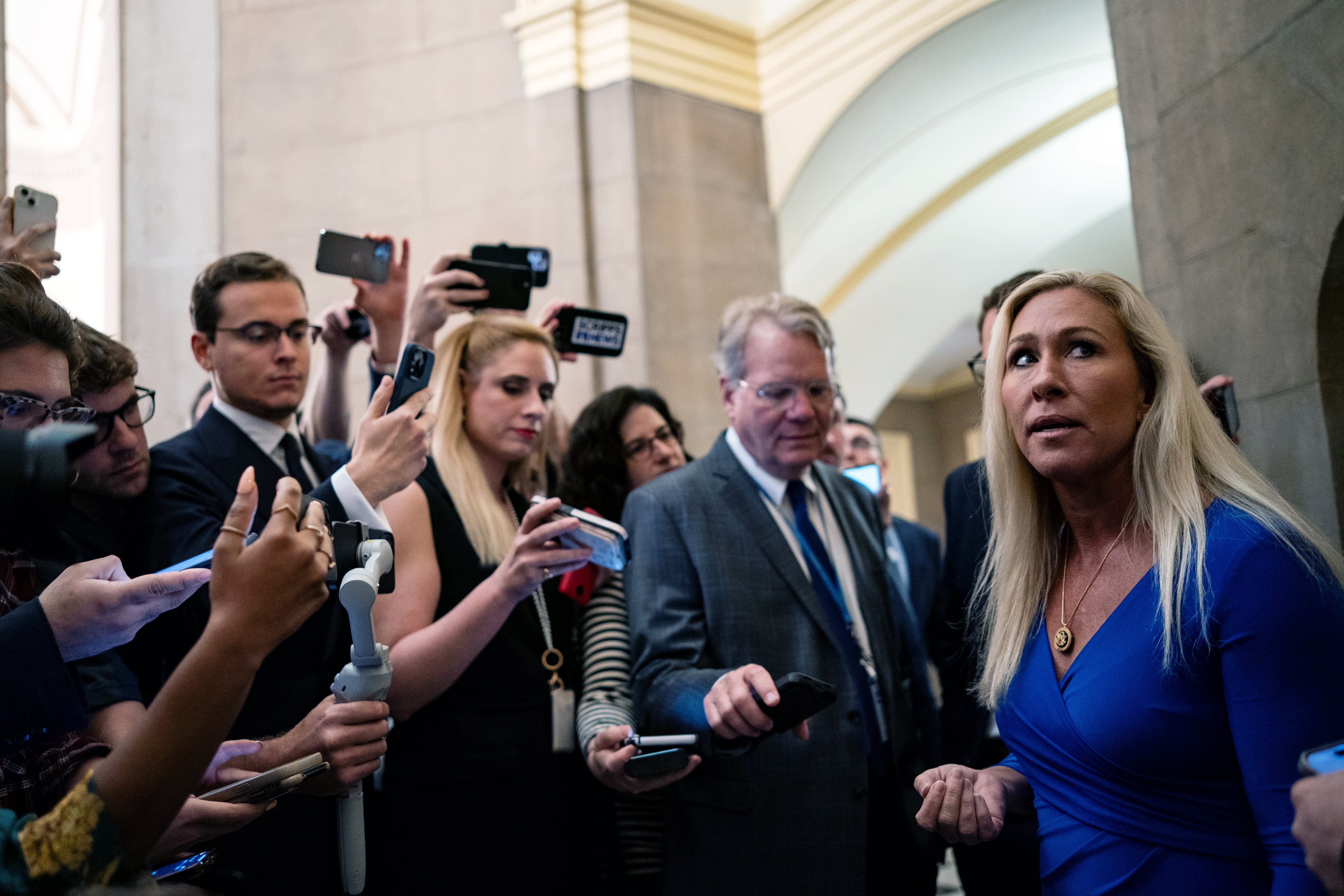 Marjorie Taylor Greene (right) speaks to reporters in the US Capitol before her second meeting with Speaker Mike Johnson on 7 May 2024. Democrats say they will vote to table her motion to vacate if she brings it forward