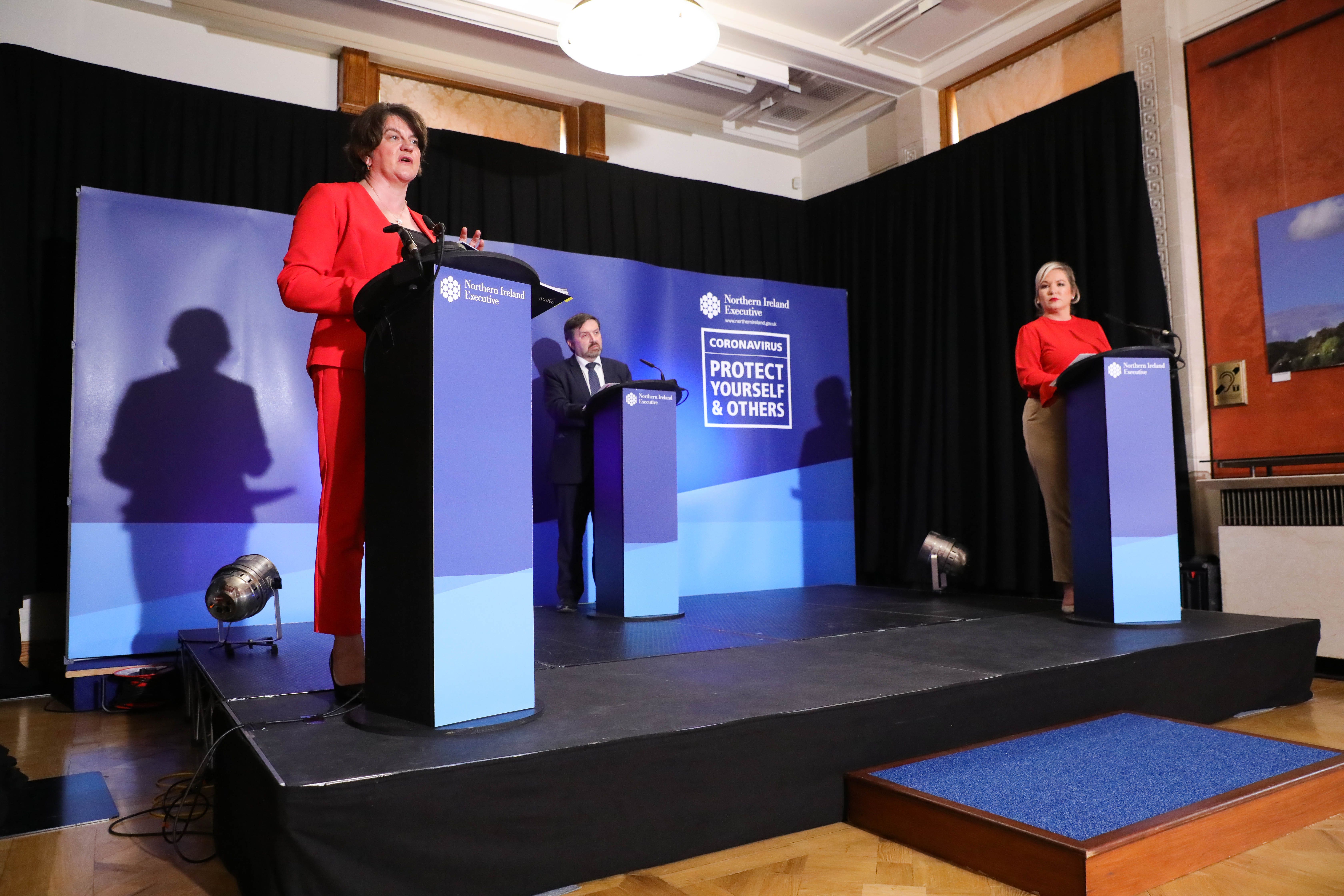 Health Minister Robin Swann with former first minister Arlene Foster and deputy first minister Michelle O’Neill (Presseye/PA)